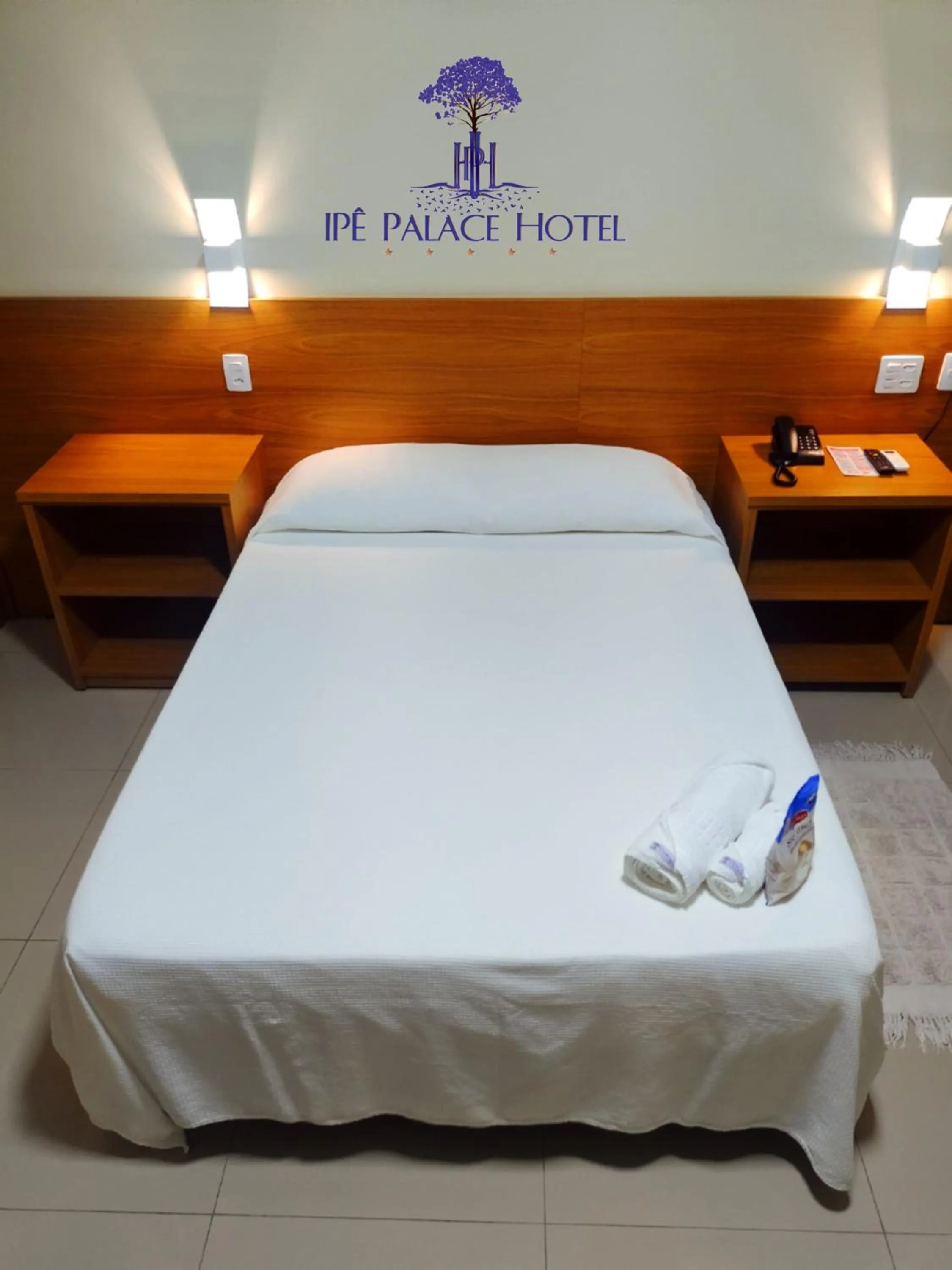 Bed in Ipê Palace Hotel