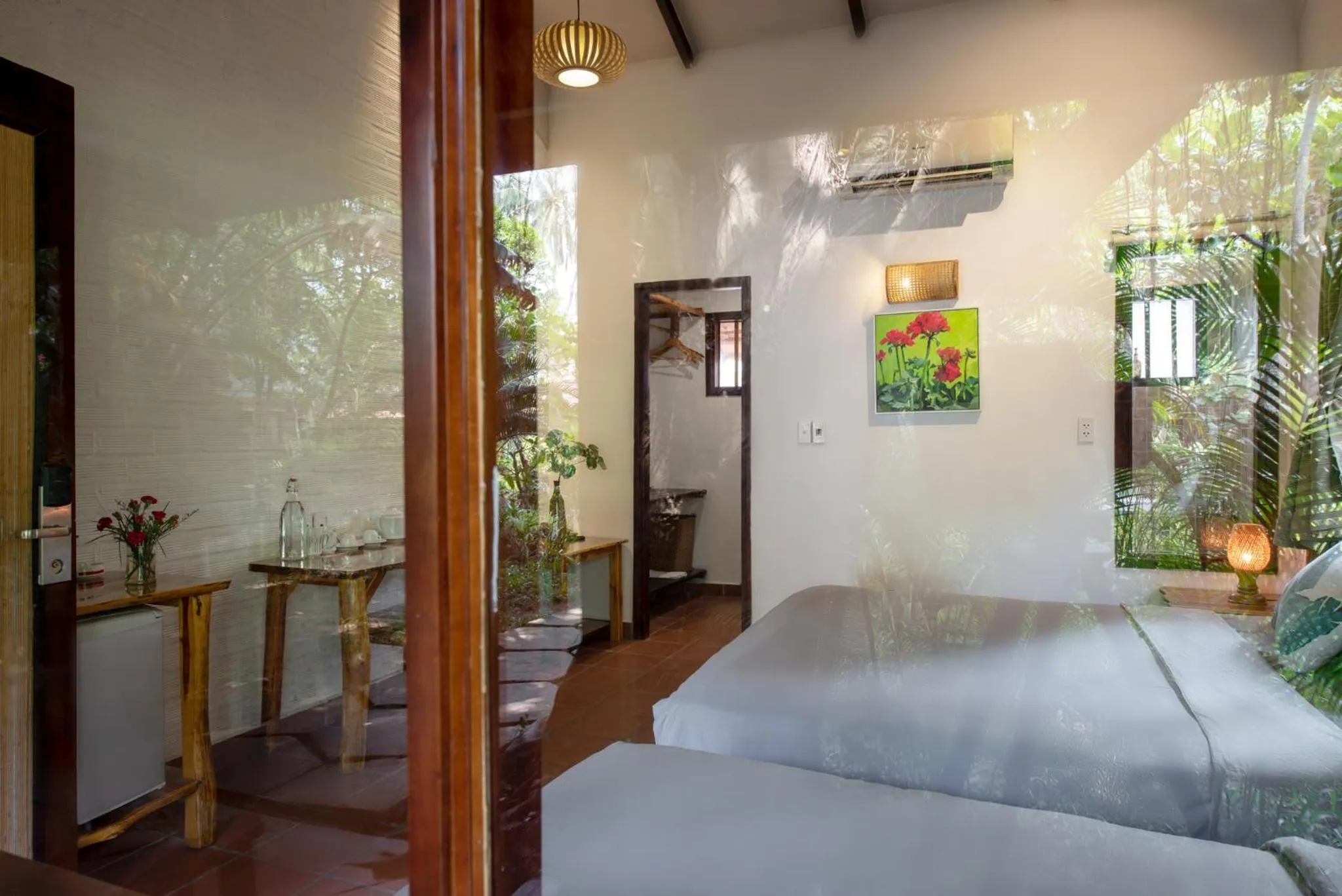 Bed in An Nhien Retreat Phu Quoc with Yoga Daily & Beach access