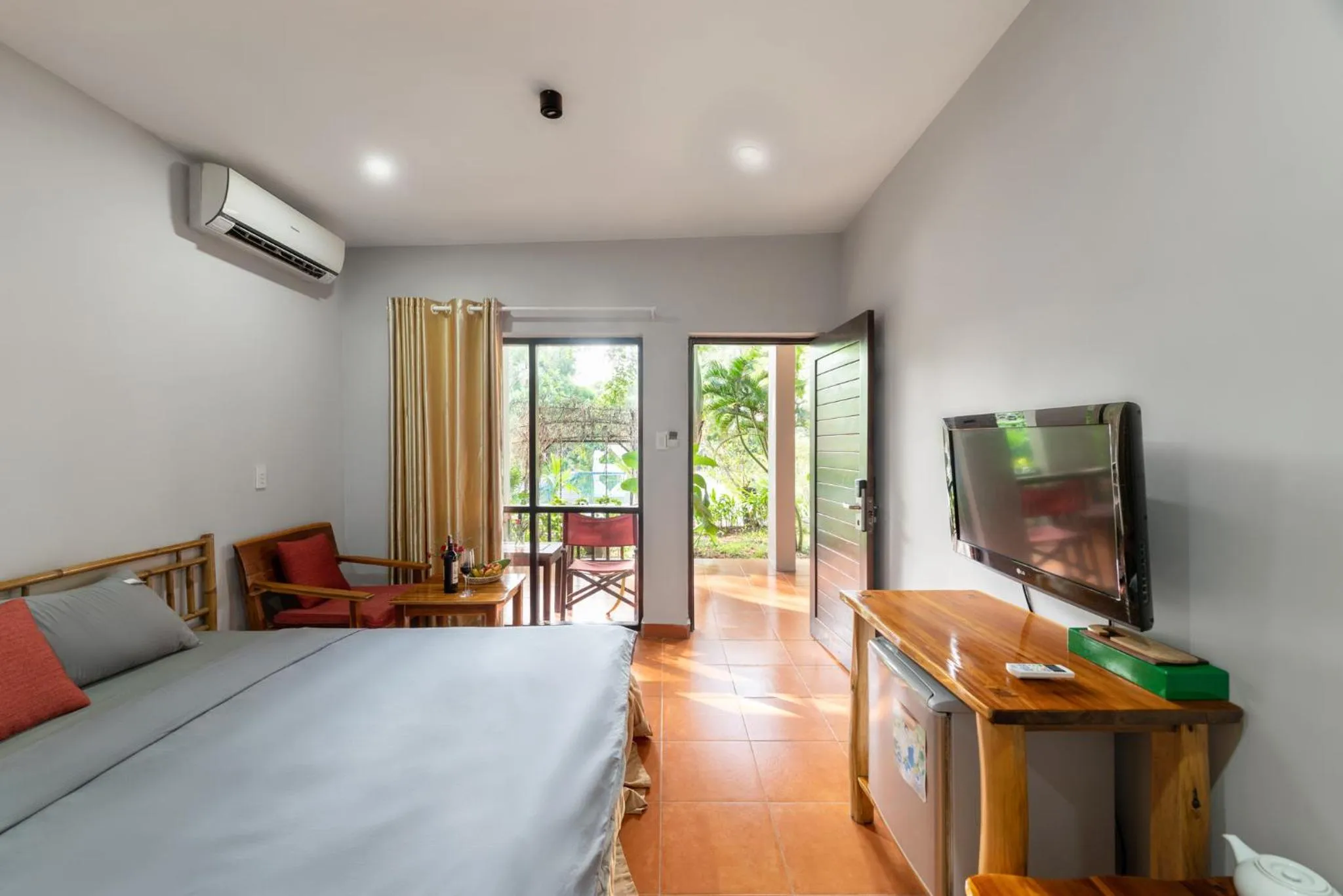 Photo of the whole room, Bed in An Nhien Retreat Phu Quoc with Yoga Daily & Beach access