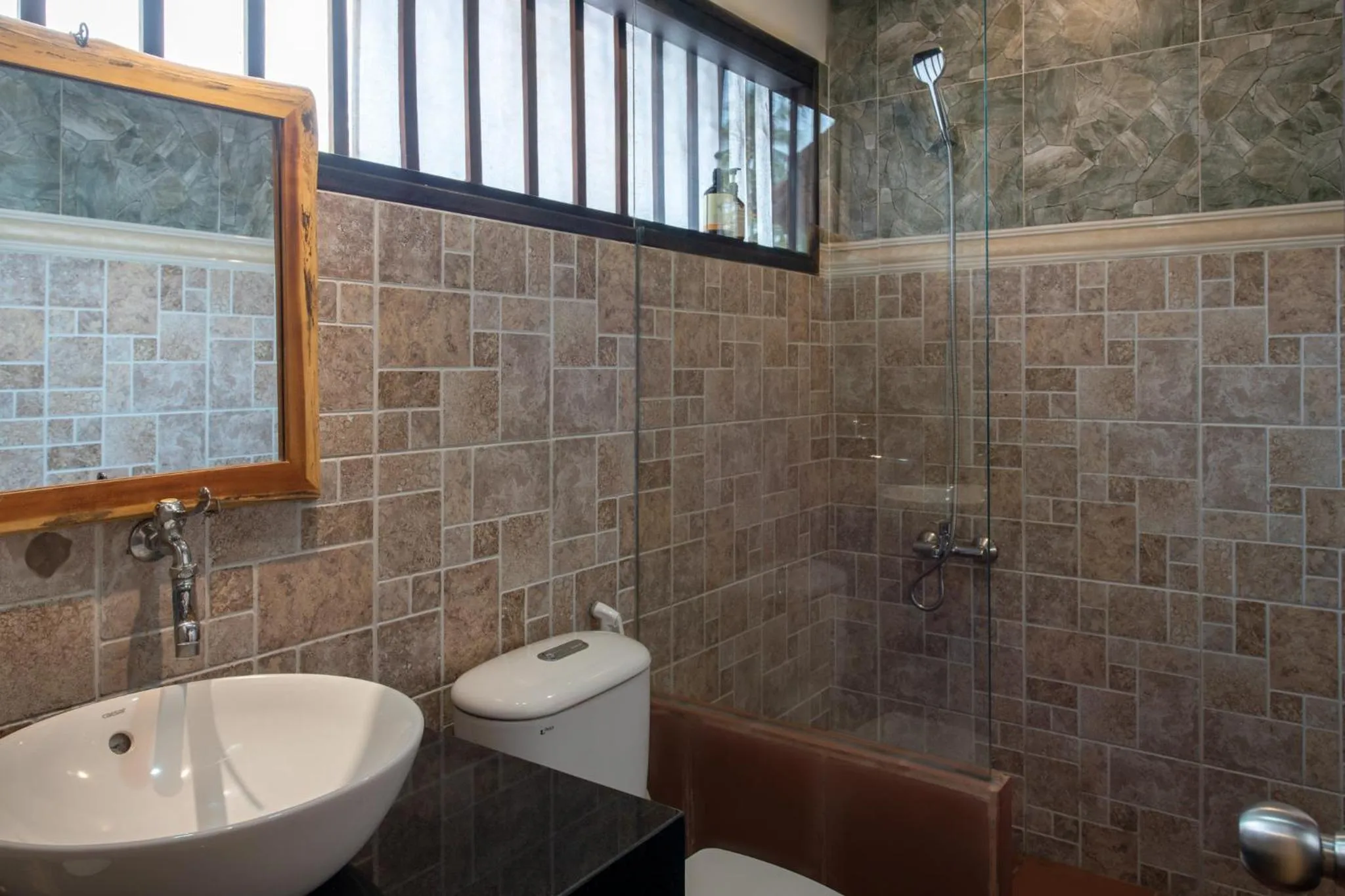 Bathroom in An Nhien Retreat Phu Quoc with Yoga Daily & Beach access