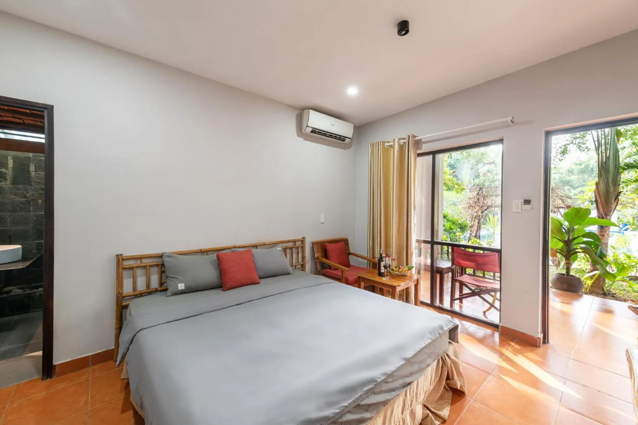 Photo of the whole room, Bed in An Nhien Retreat Phu Quoc with Yoga Daily & Beach access
