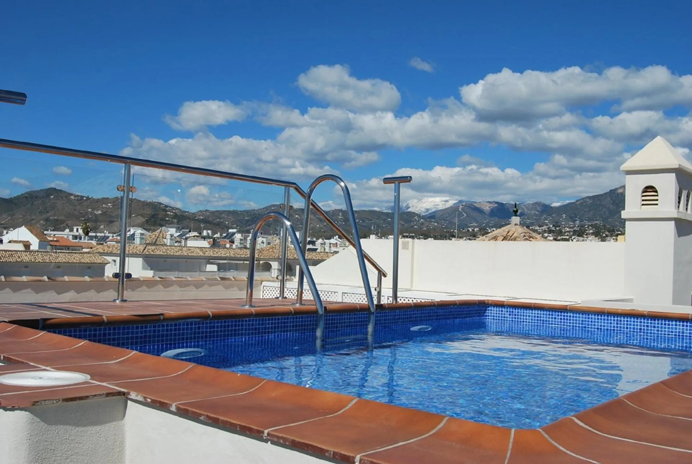 Swimming pool in Apartamentos Plaza