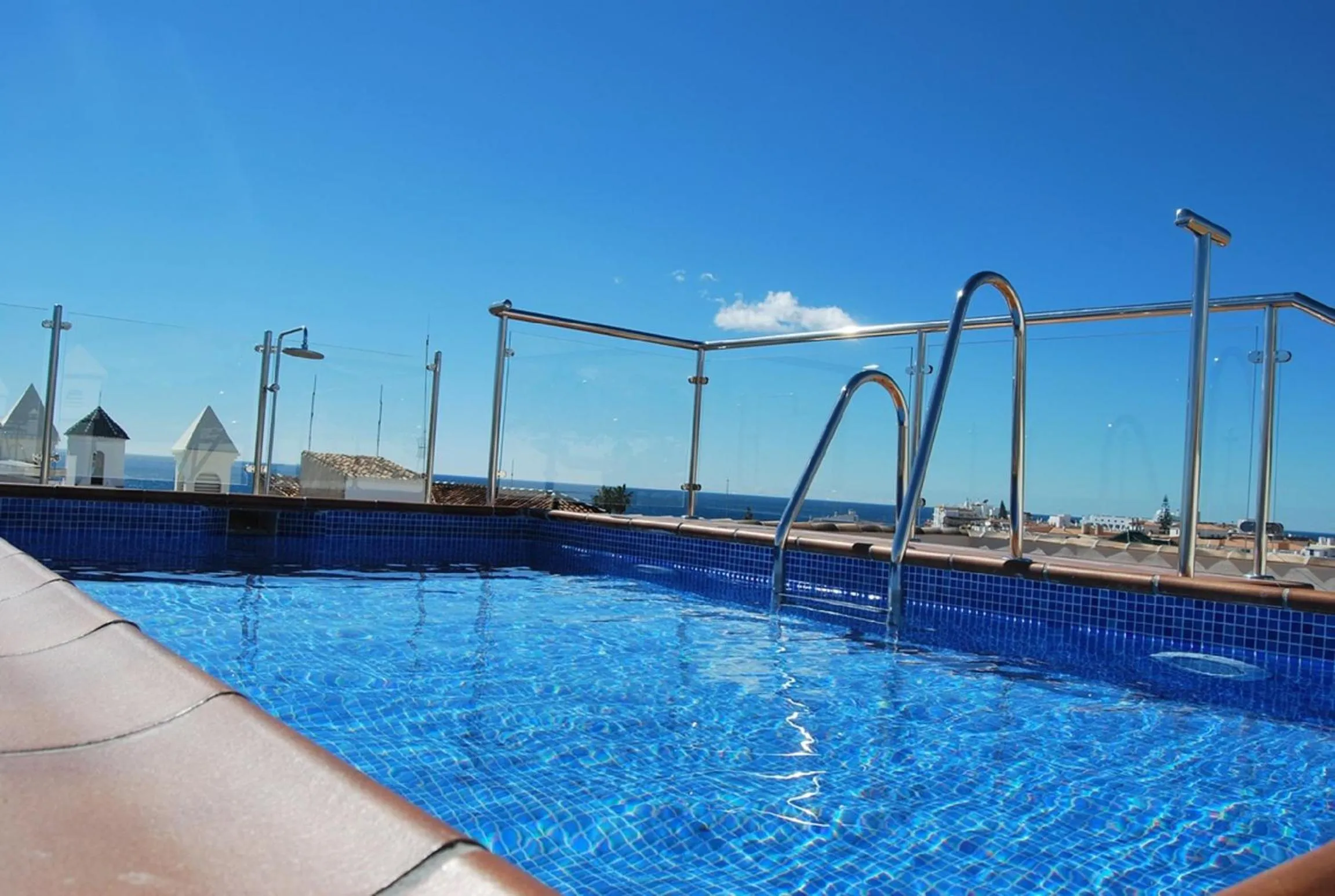 Swimming pool in Apartamentos Plaza