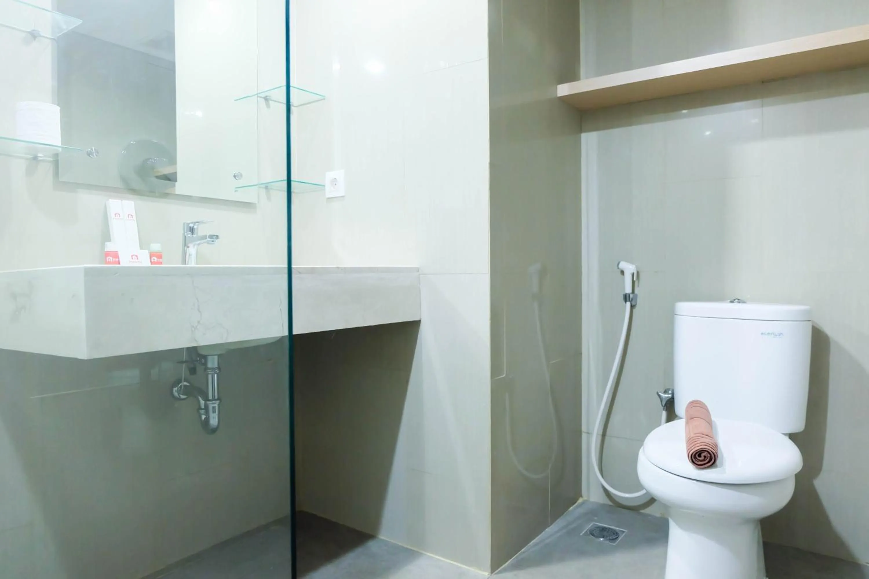 Bathroom in Modern and Brand New Studio Apartment H Residence By Travelio