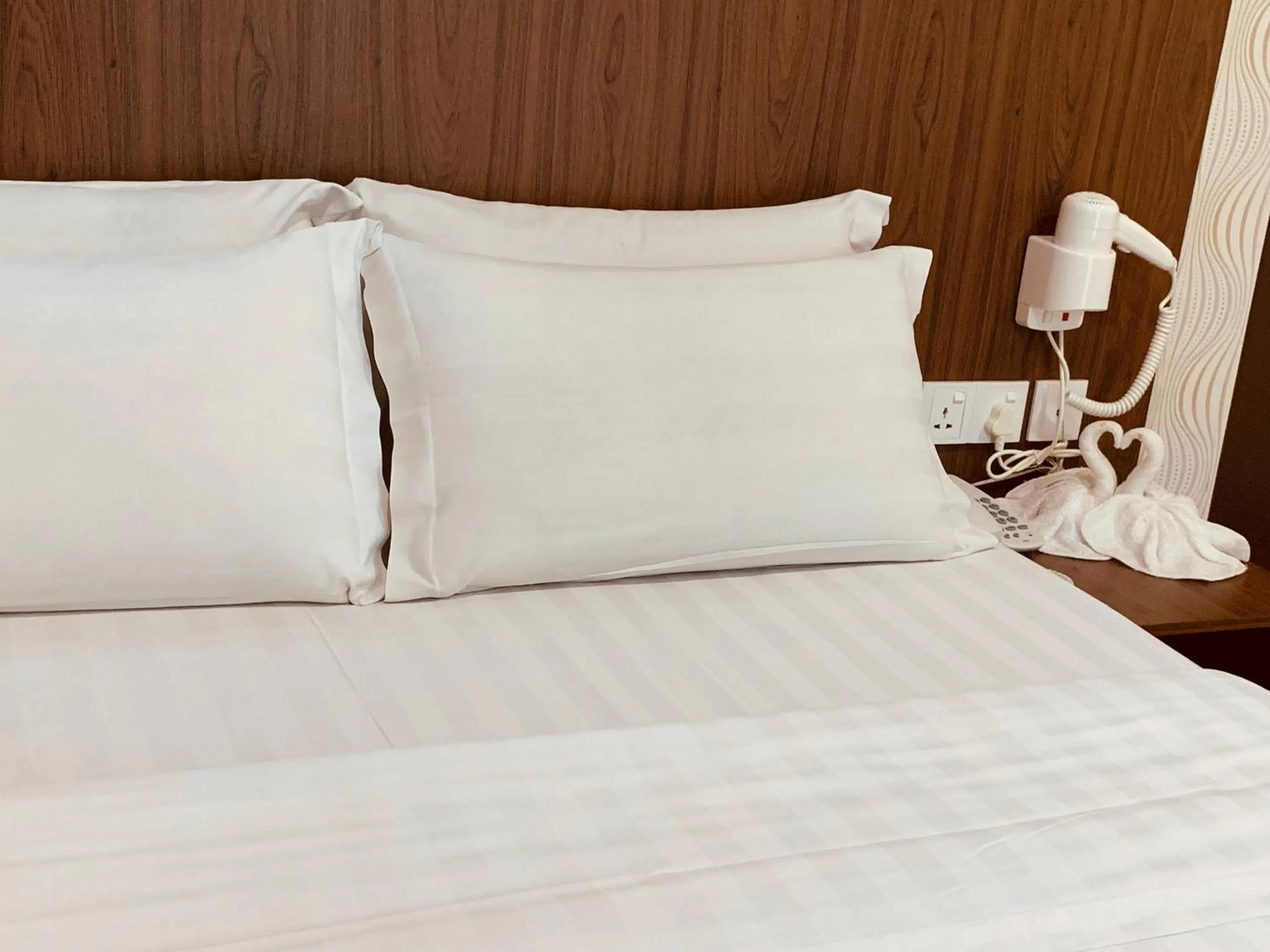 Bed in Mii Smile Hotel Penang