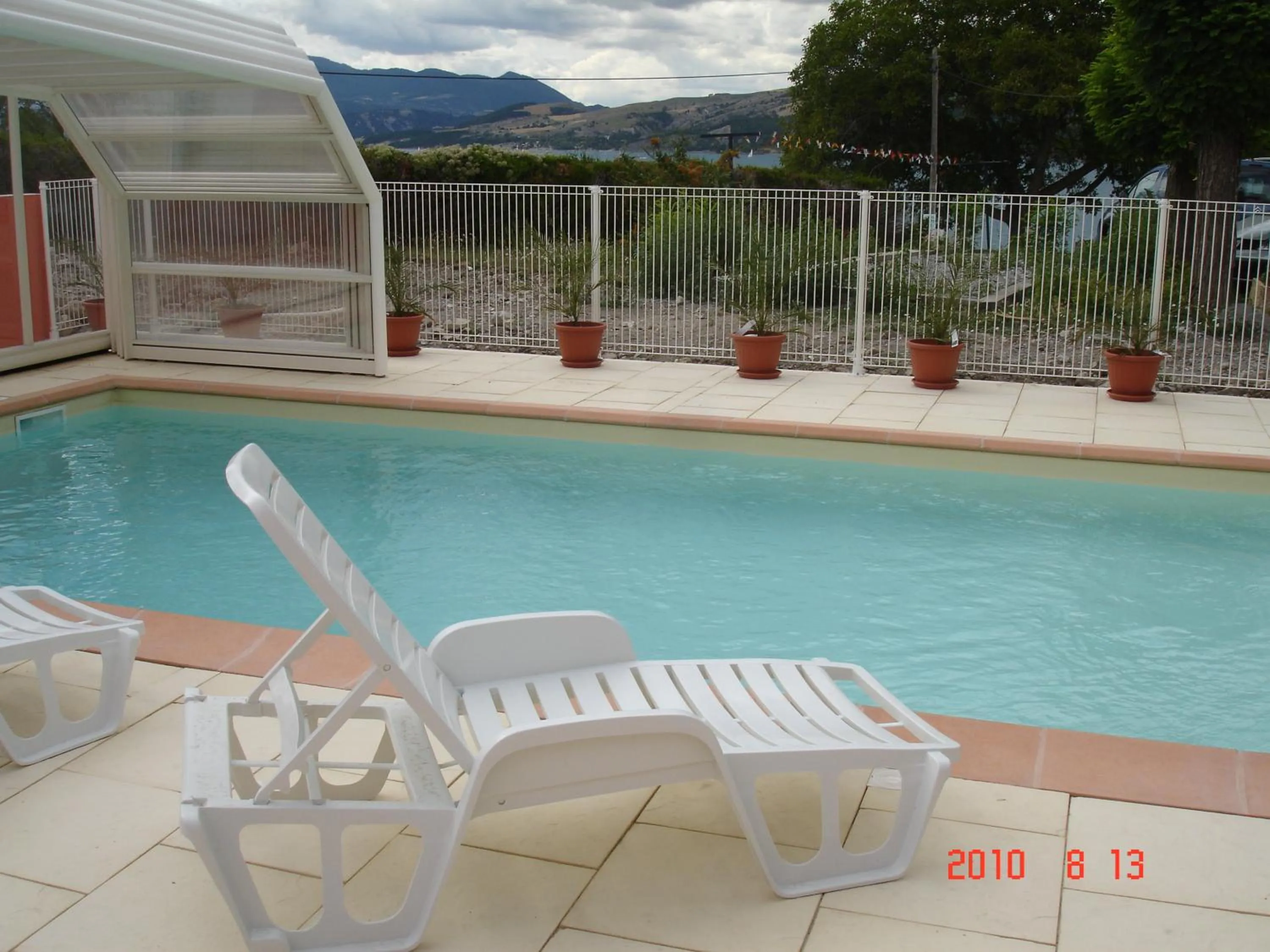 Swimming pool in Hôtel Les Flots Bleus