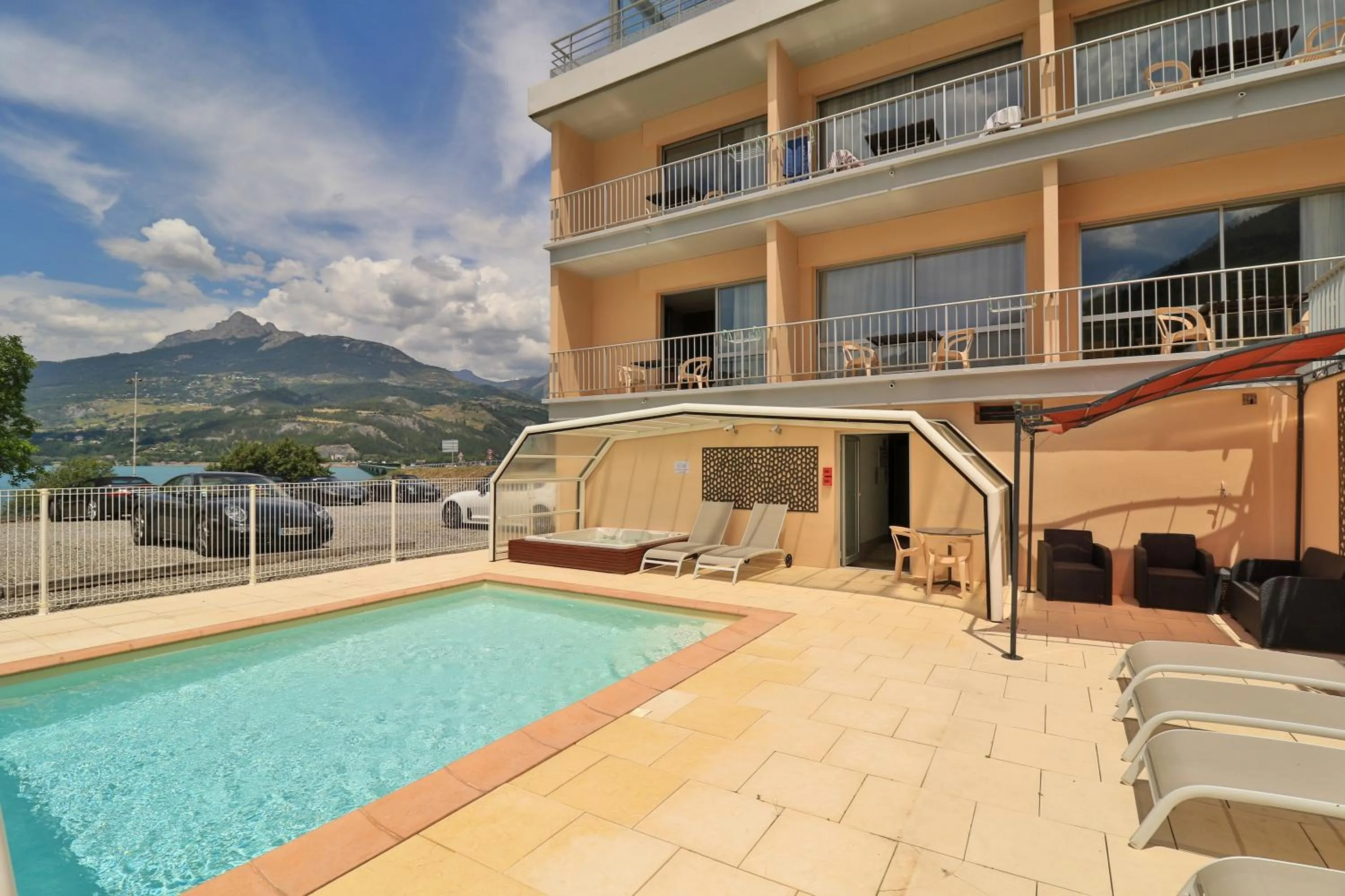 Swimming pool in Hôtel Les Flots Bleus