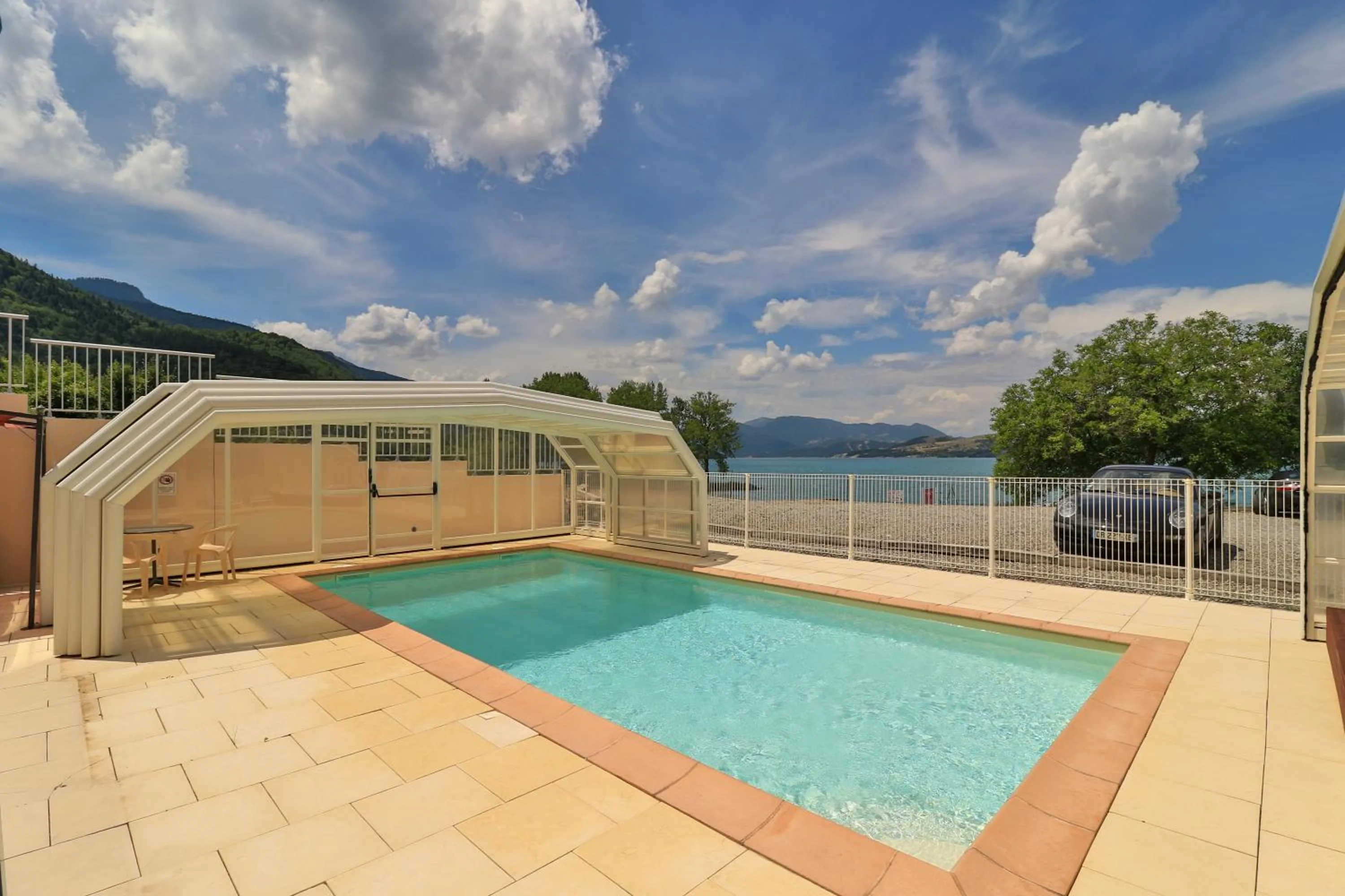 Swimming pool in Hôtel Les Flots Bleus