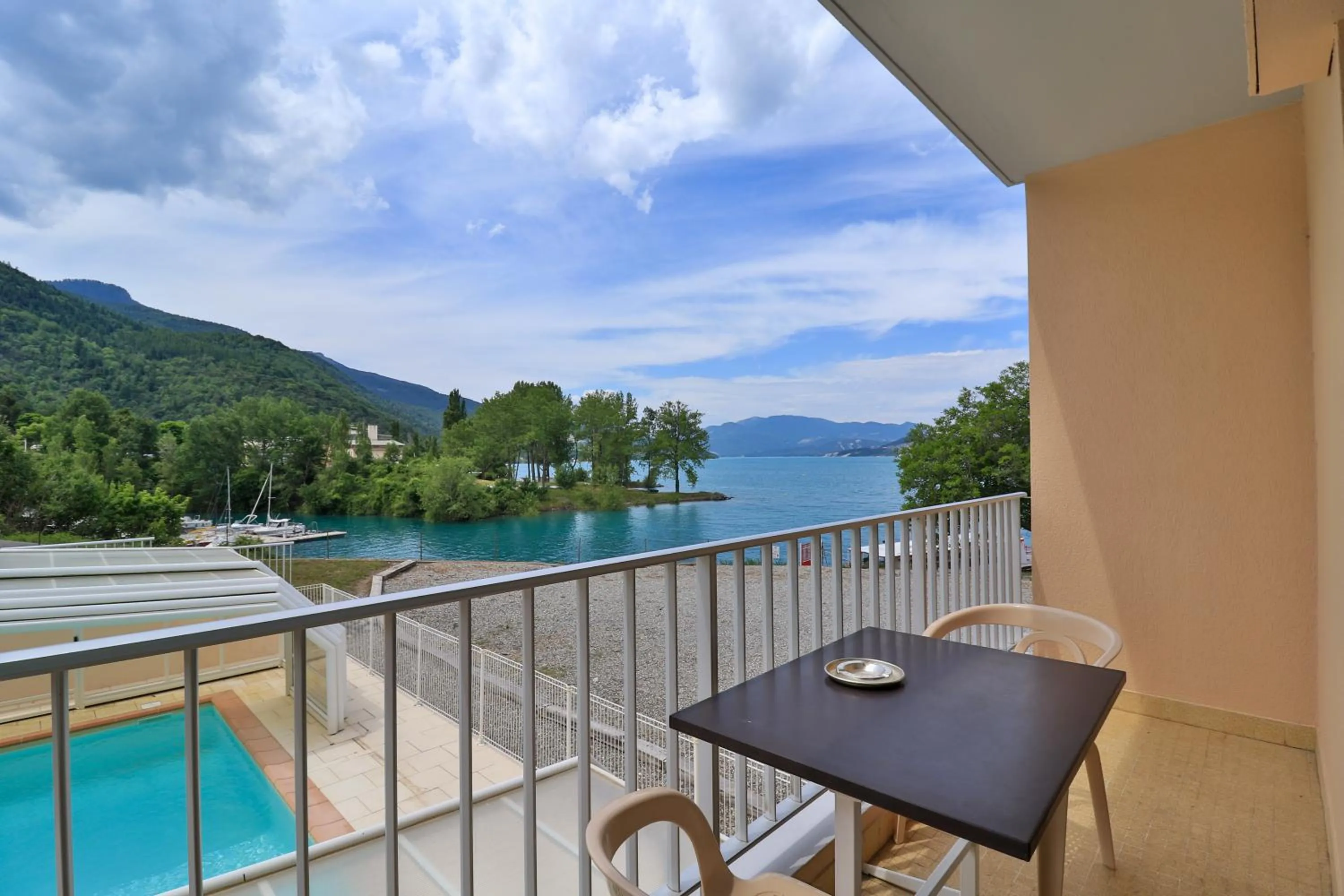 Swimming pool in Hôtel Les Flots Bleus