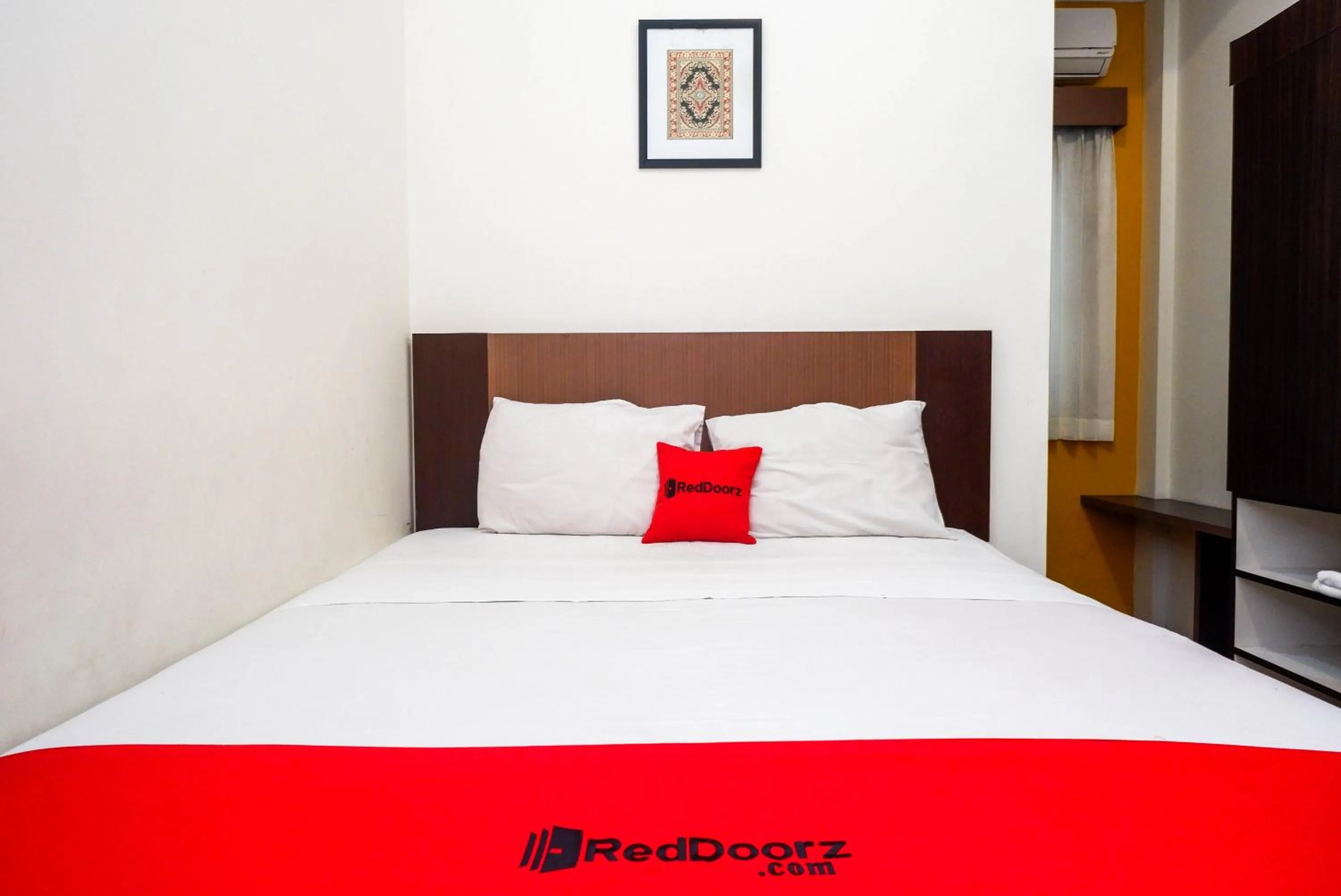 Bed in RedDoorz Syariah At Namira Hotel