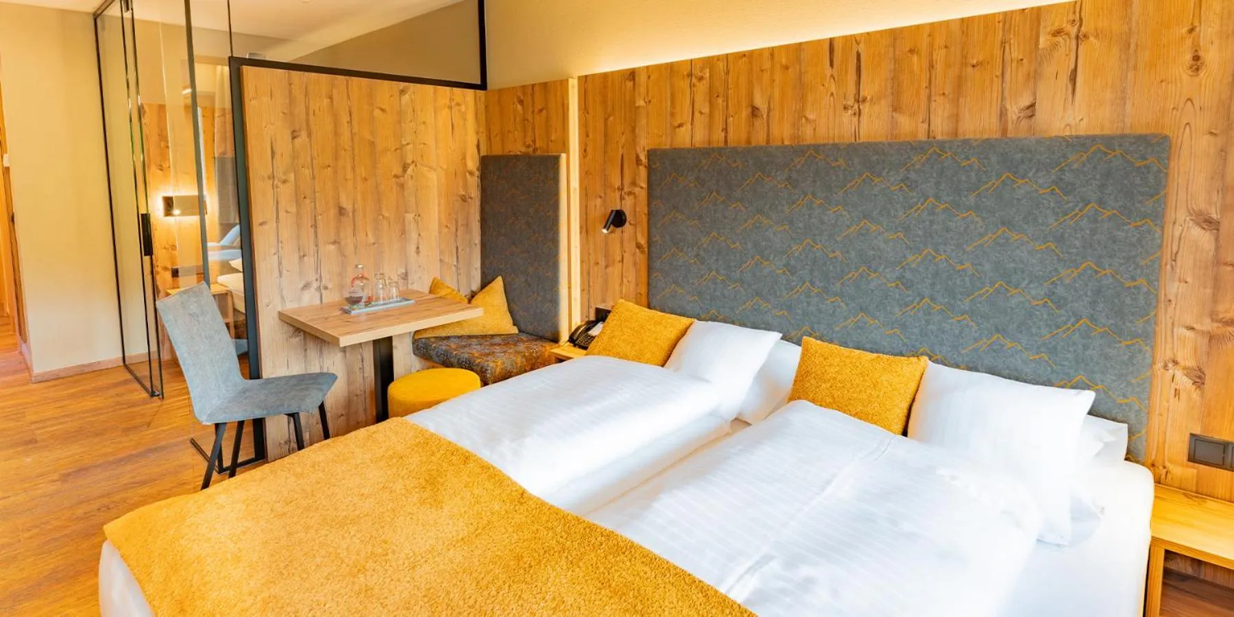 Photo of the whole room, Bed in Alpenbad Hotel Hohenhaus