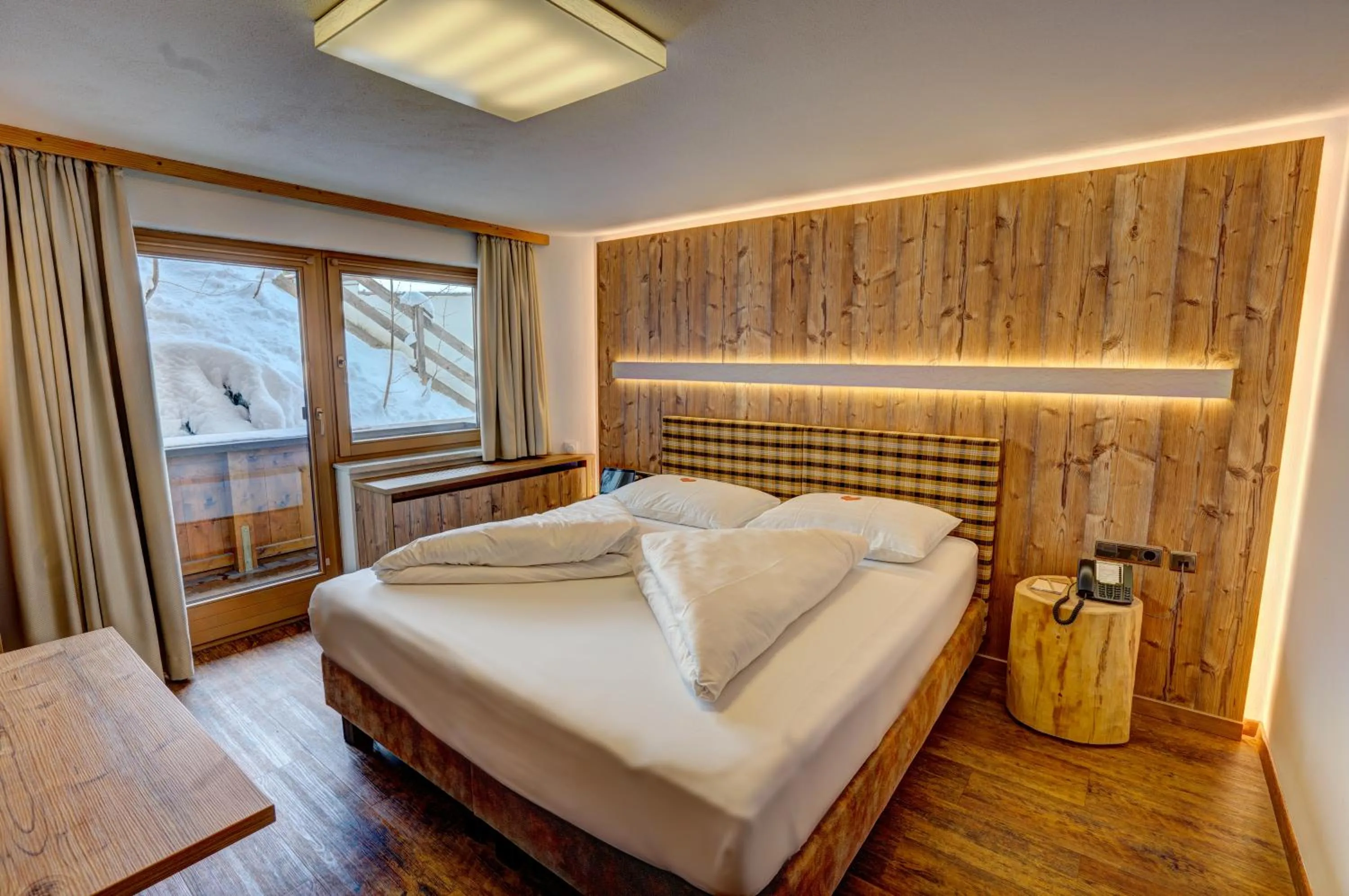 Photo of the whole room, Bed in Alpenbad Hotel Hohenhaus