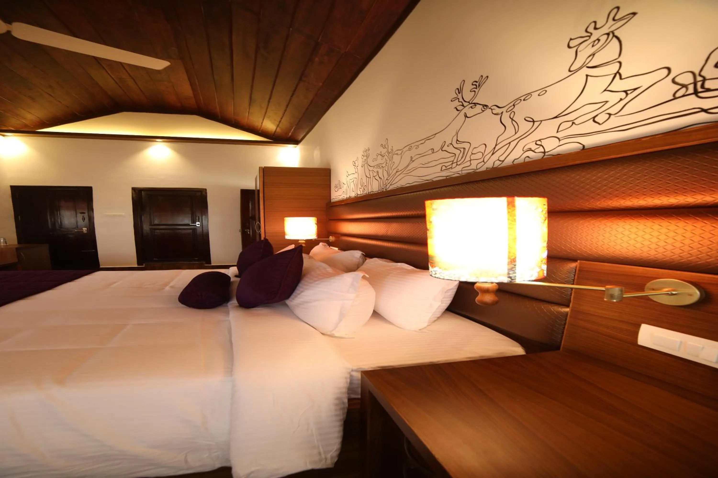 Bed in CONTOUR ISLAND RESORT & SPA , wayanad