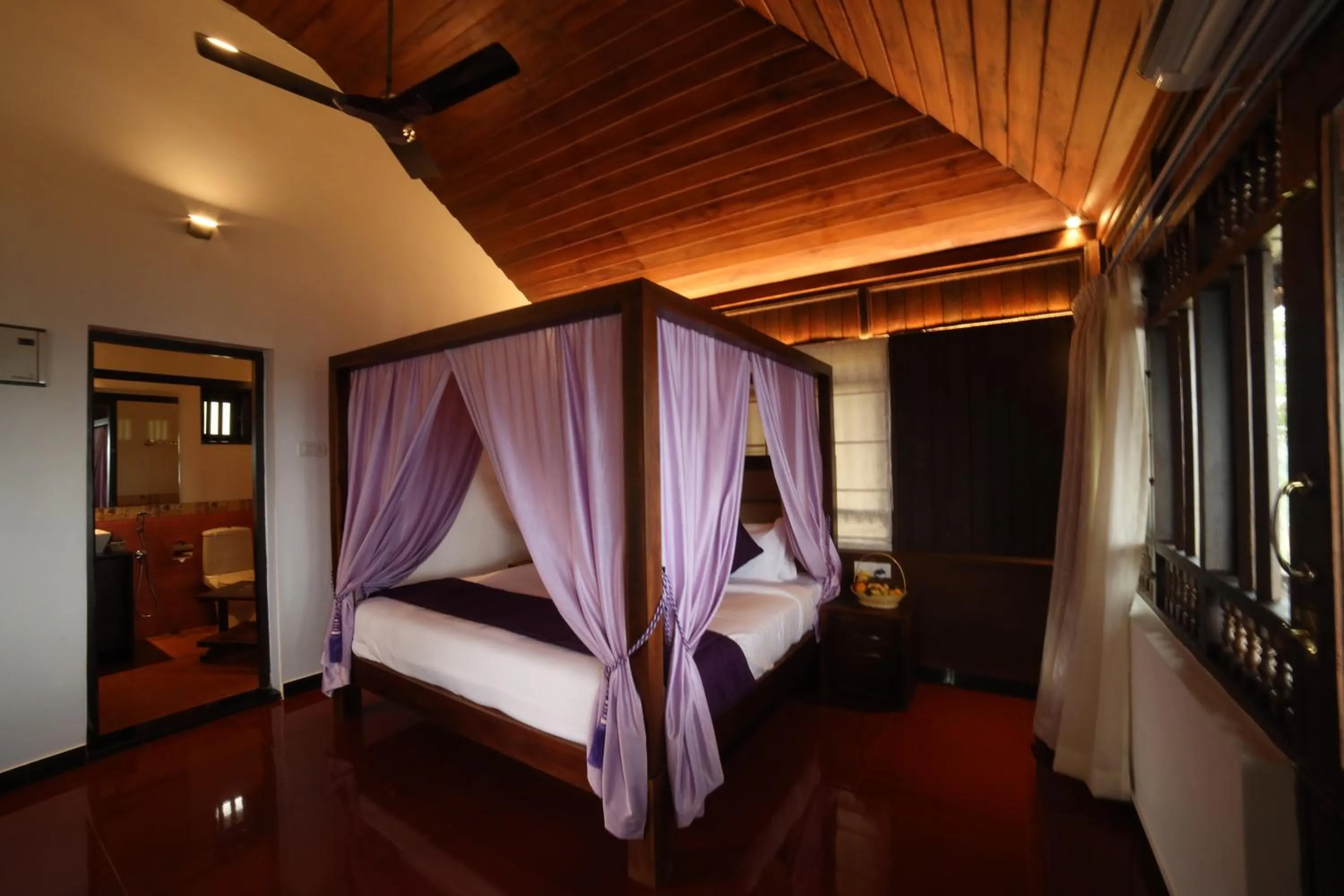 Bed in CONTOUR ISLAND RESORT & SPA , wayanad