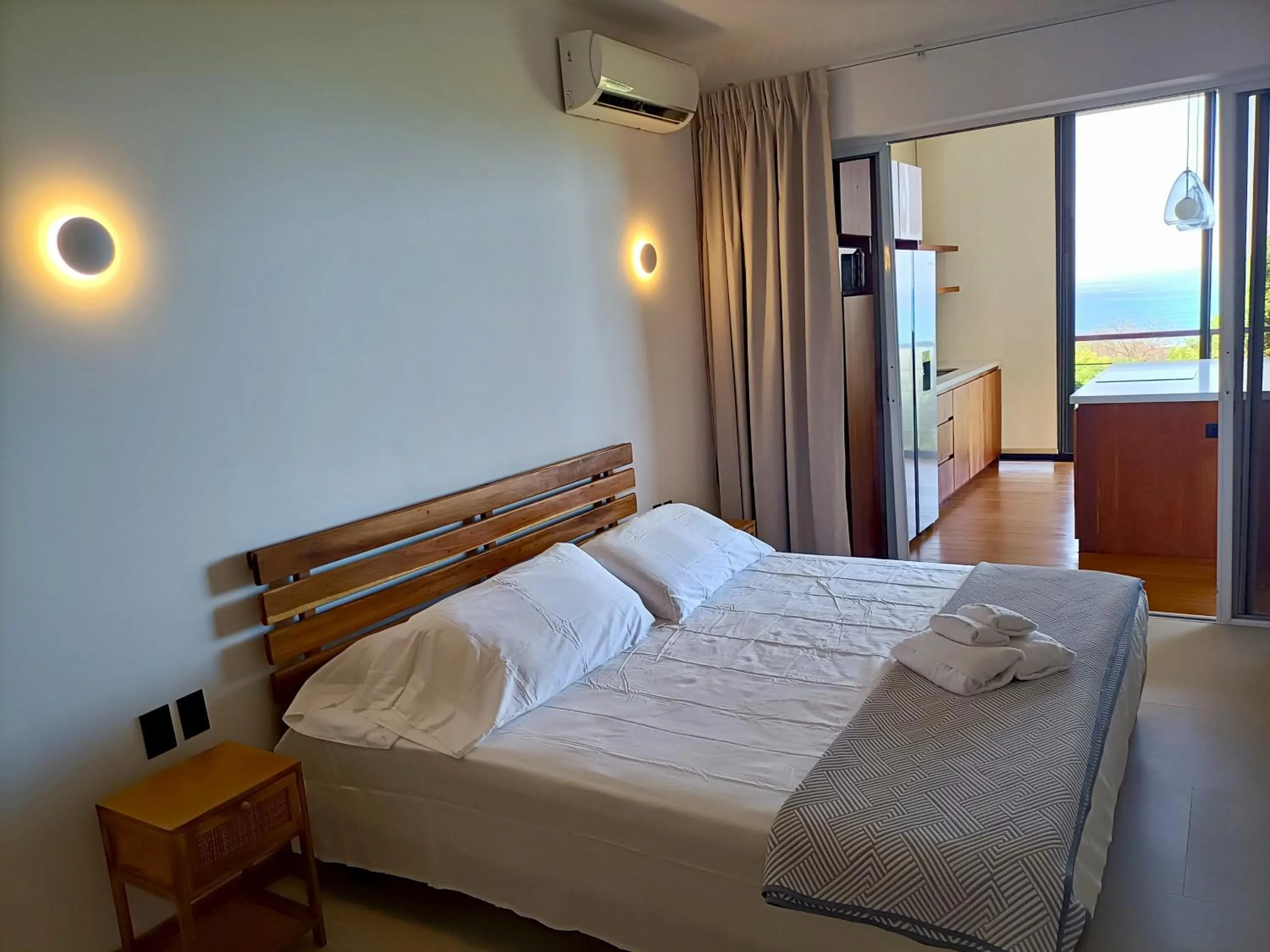 Bed in Vista Naranja Ocean View - Suite Apartment