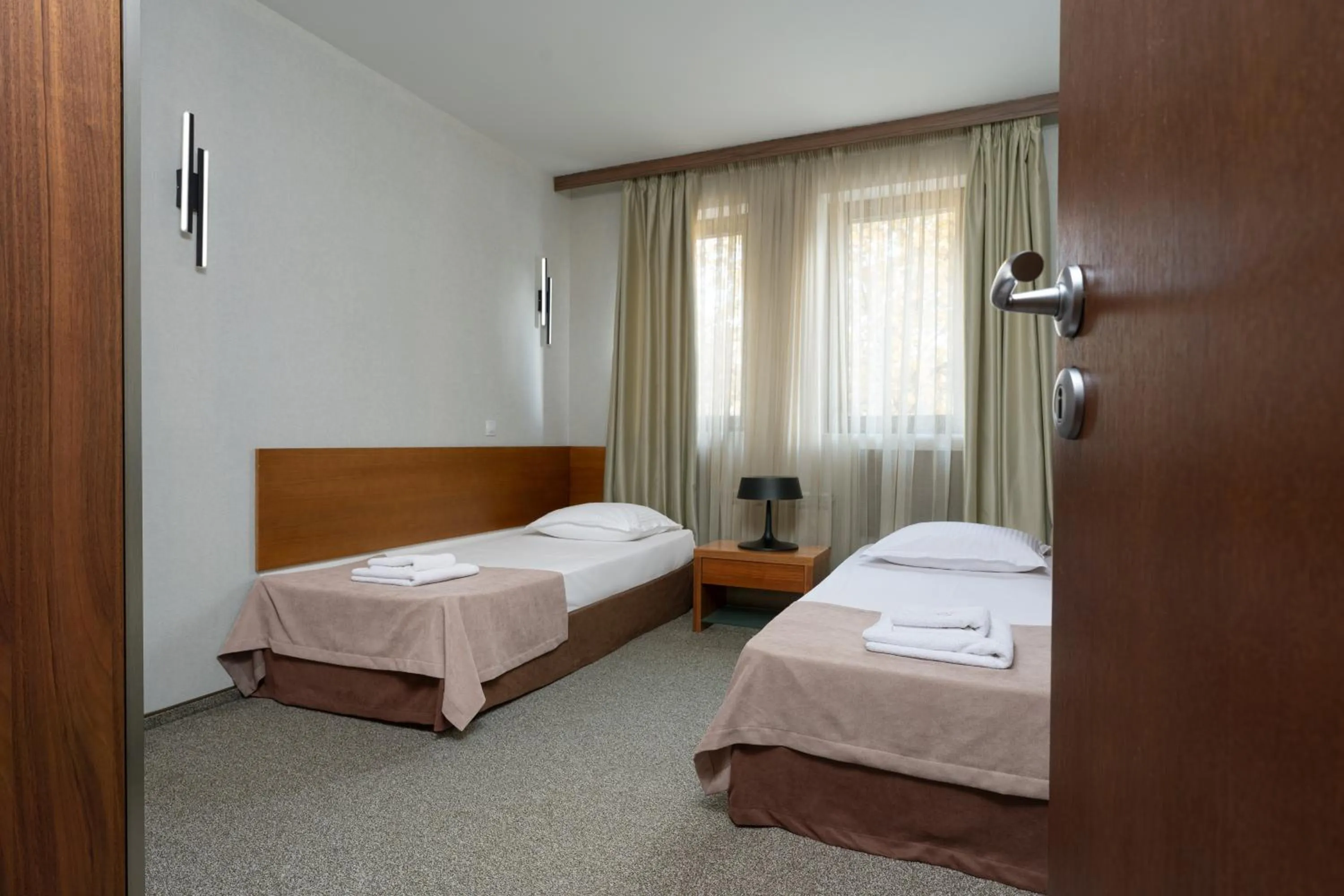 Bed in Boutique Hotel Uniqato