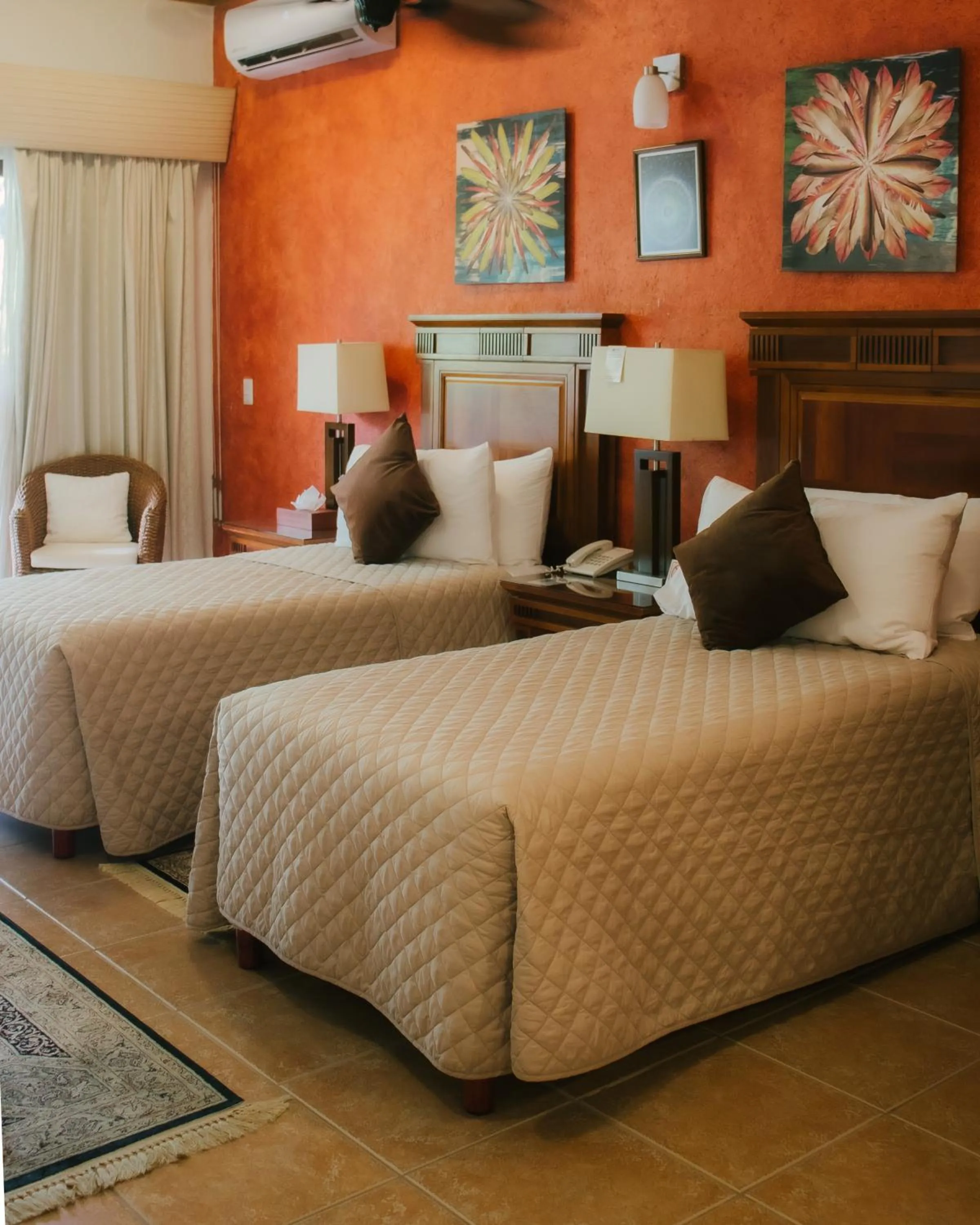 Bed in La Buena Vibra Wellness Resort & Spa