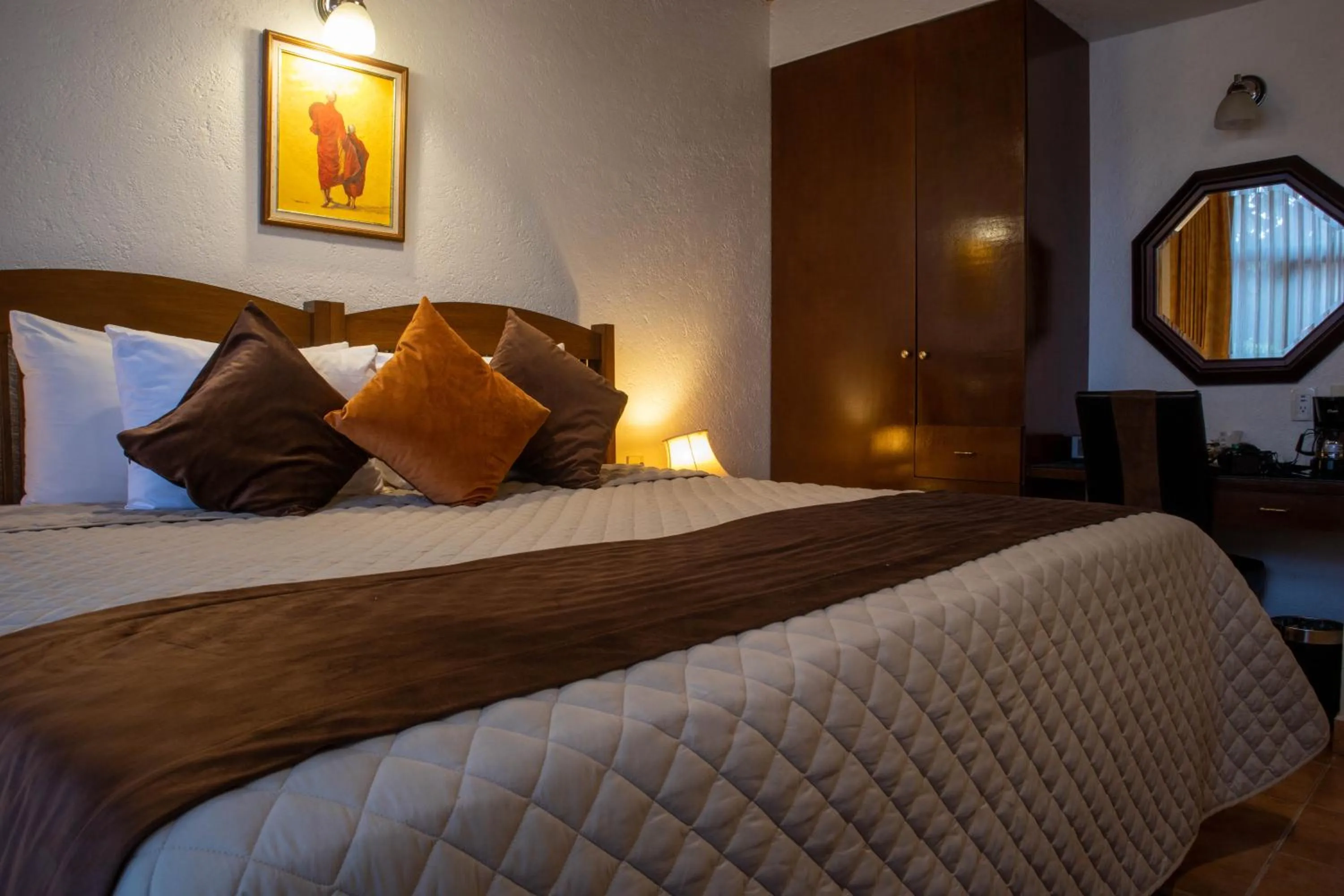 Bed in La Buena Vibra Wellness Resort & Spa