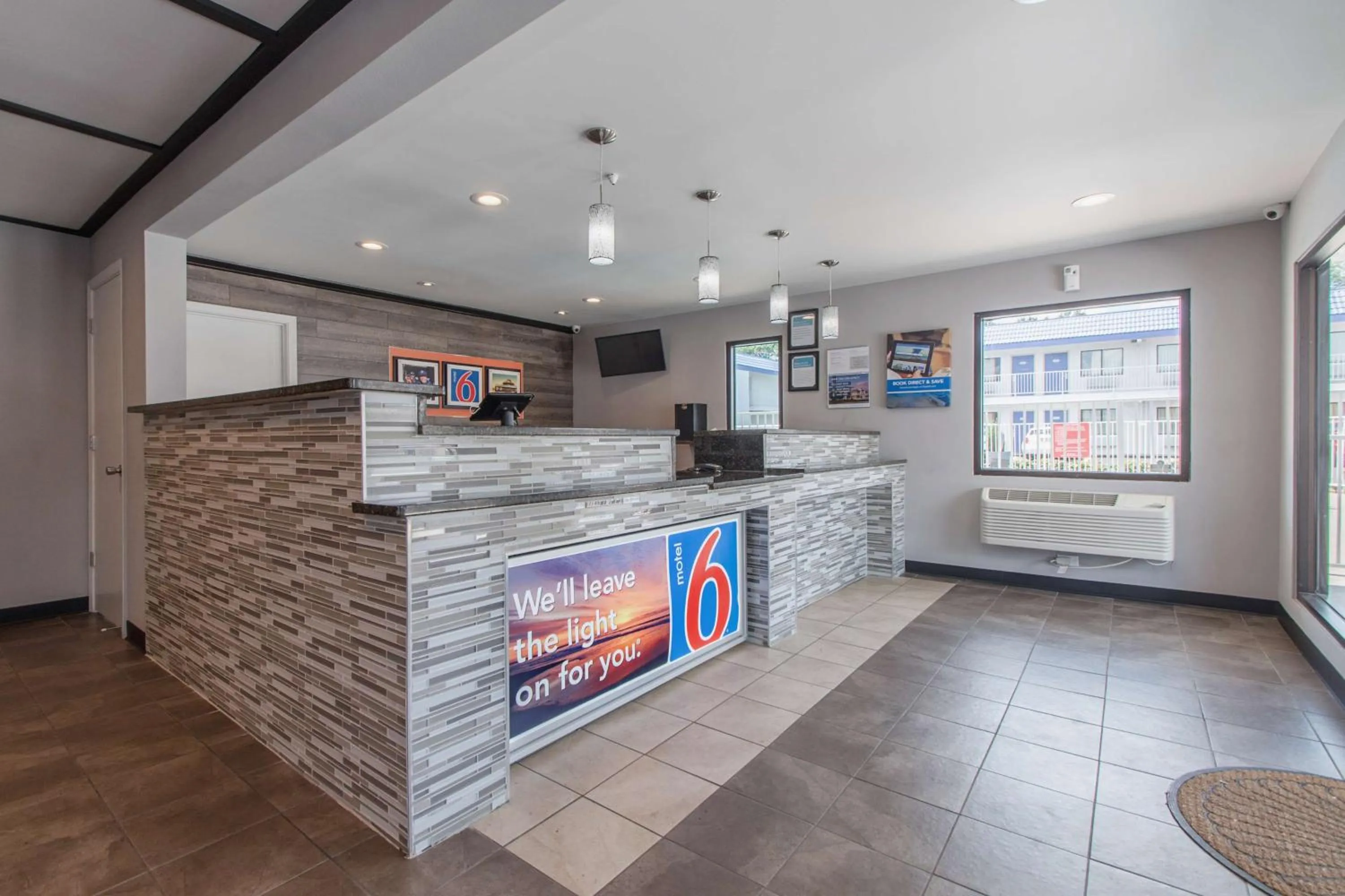 Property logo or sign in Motel 6-Norcross, GA - Atlanta Northeast