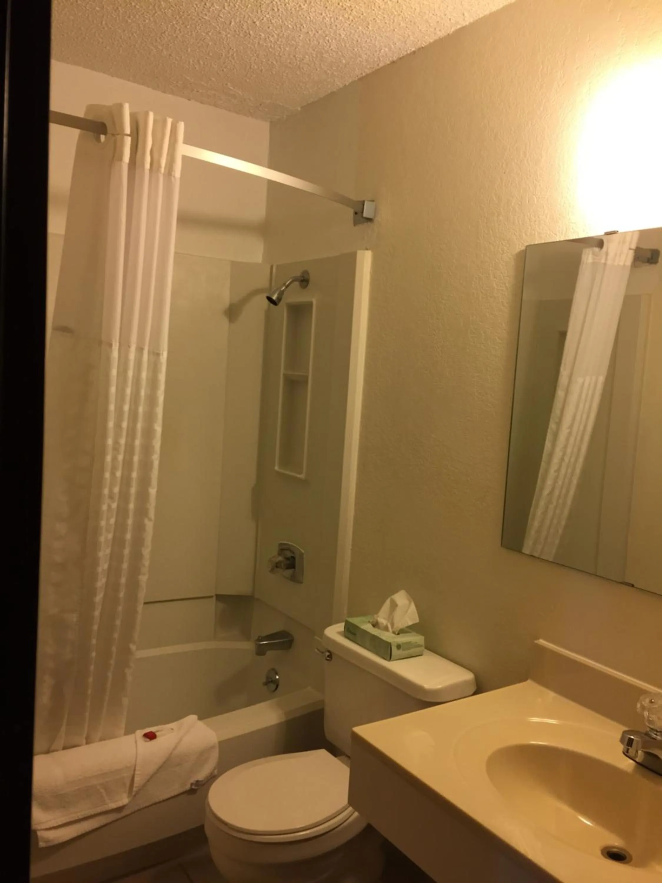 Toilet in Super 8 by Wyndham Raton