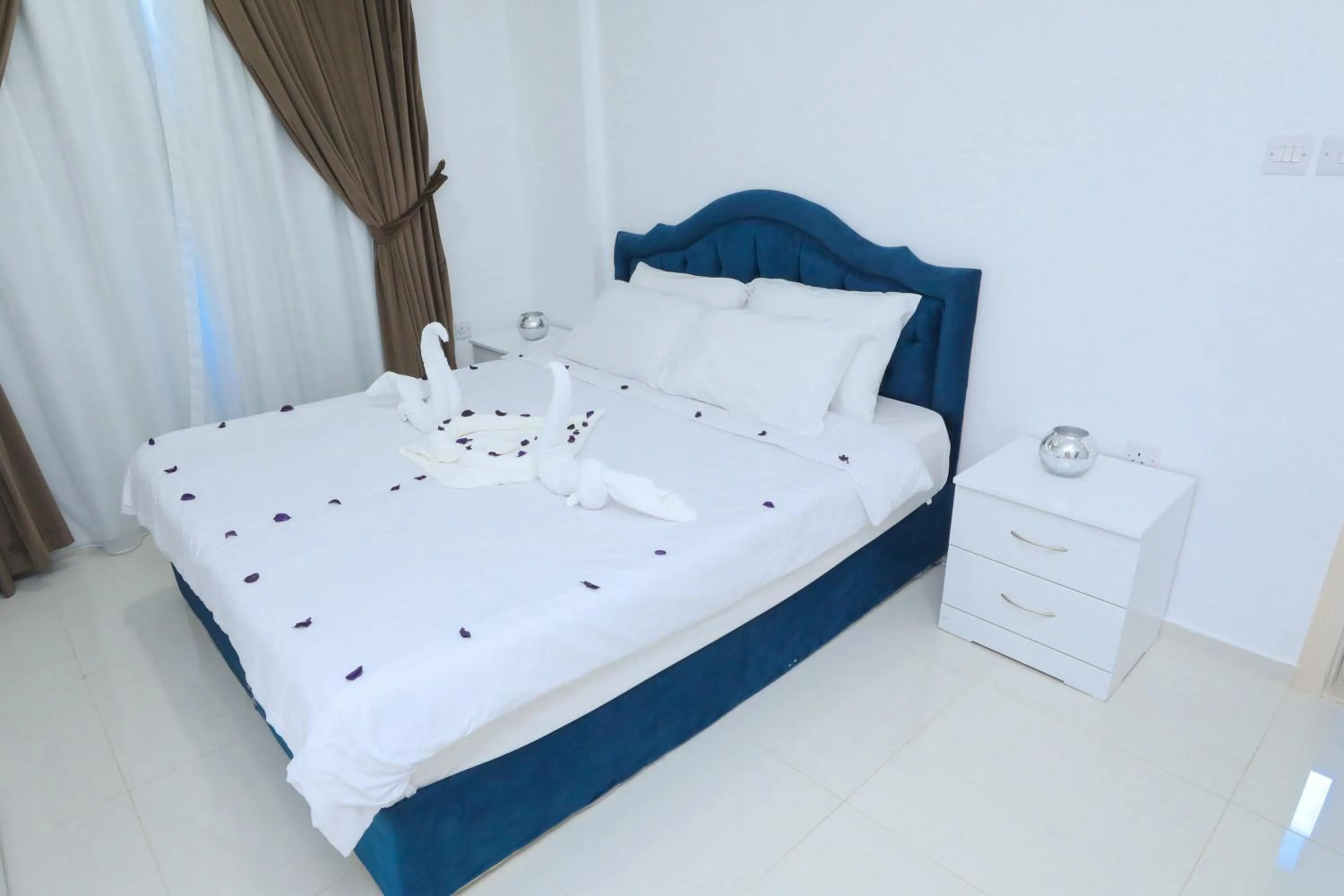Bed in ماجيك سويت بوليفارد Magic Suite Boulevard