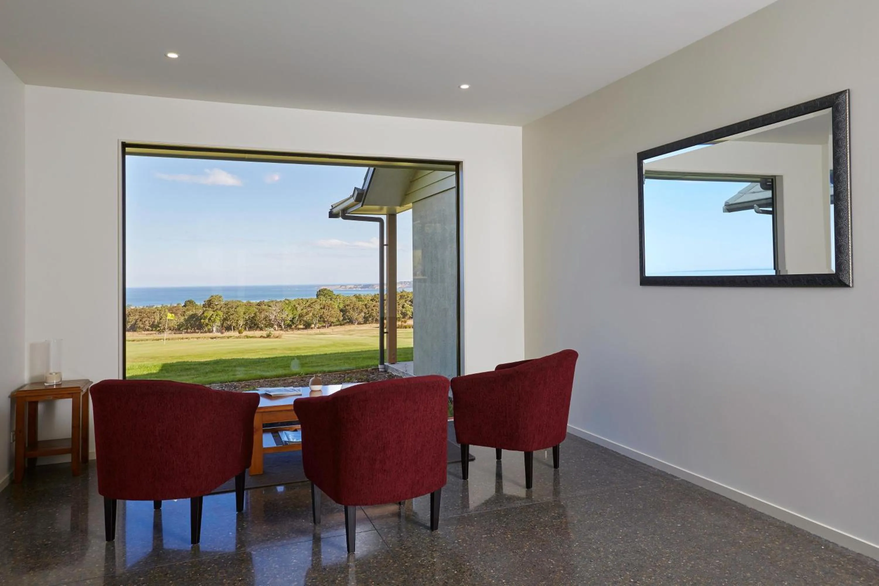 Communal lounge/ TV room in Koura Bay Golf Resort