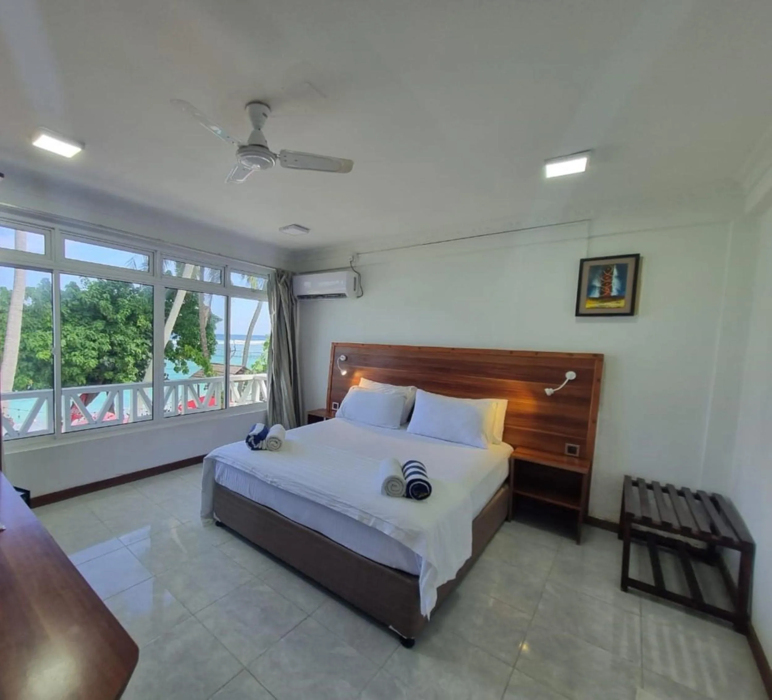 Property building, Bed in Batuta Maldives Surf View