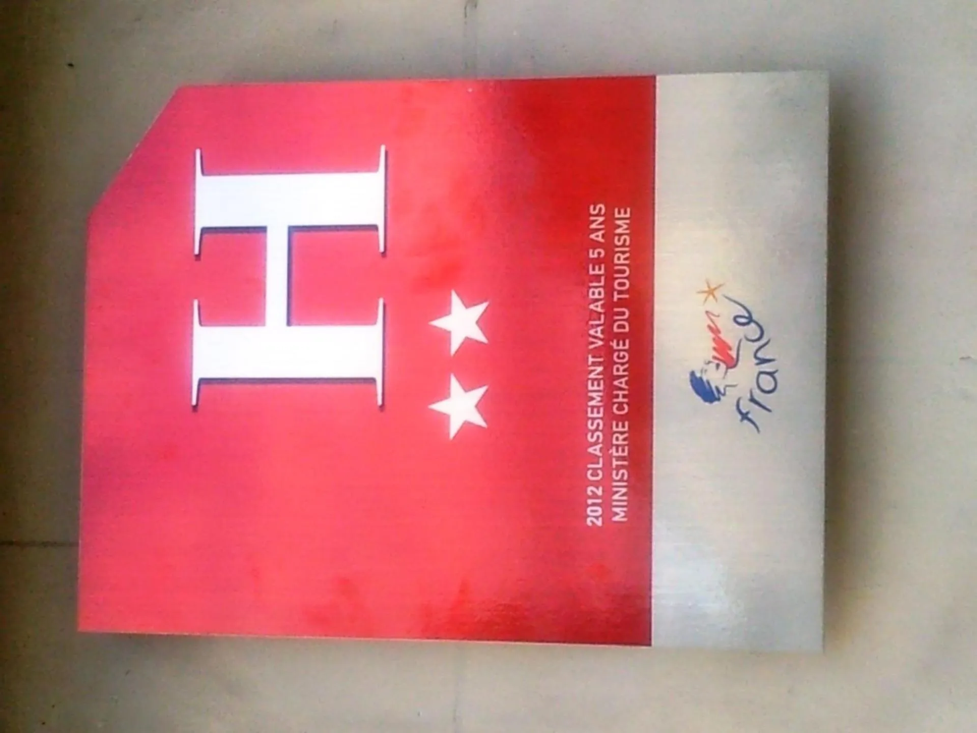 Property logo or sign in Hôtel Le Centre