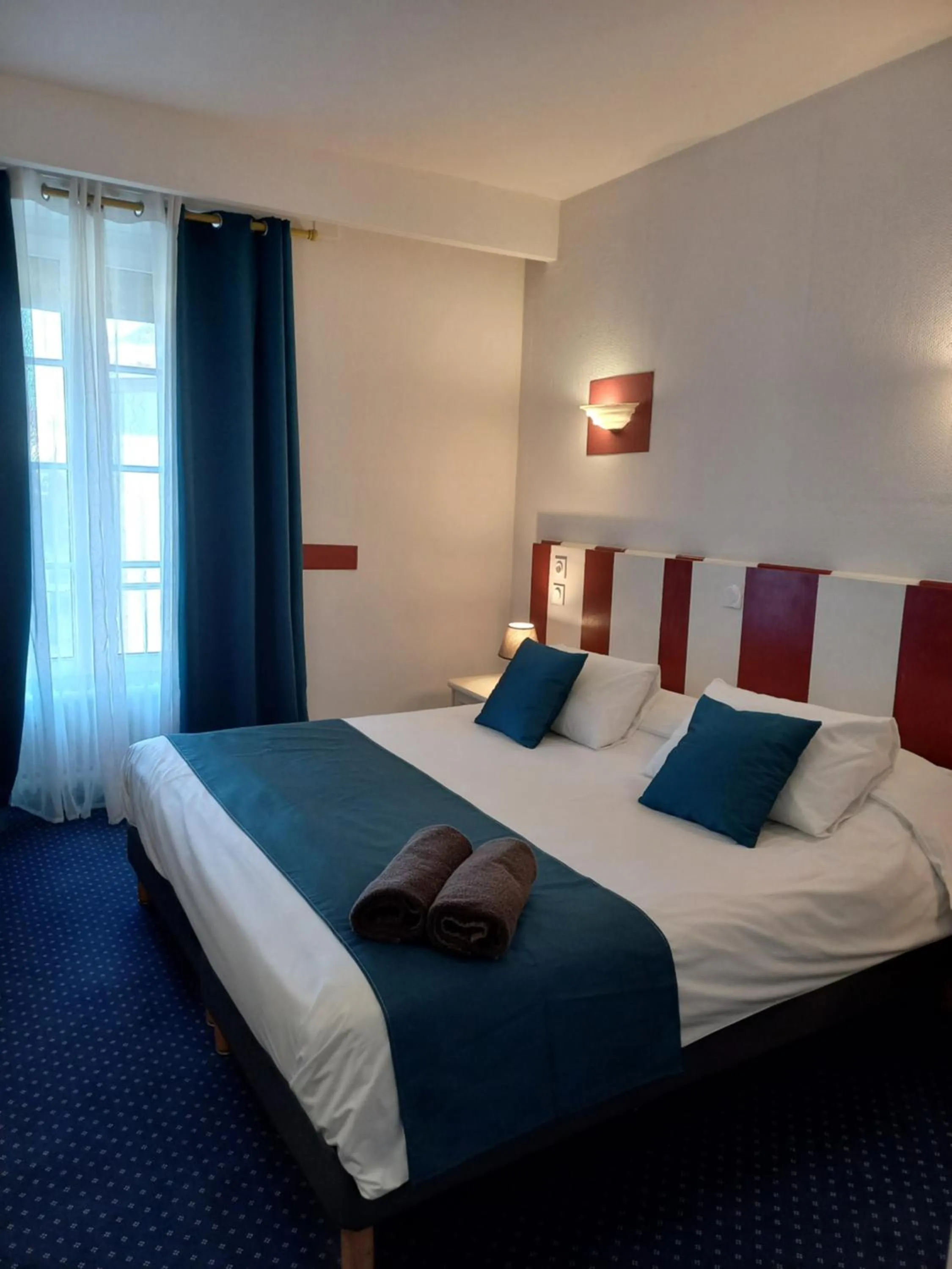 Photo of the whole room, Bed in Hôtel Le Centre