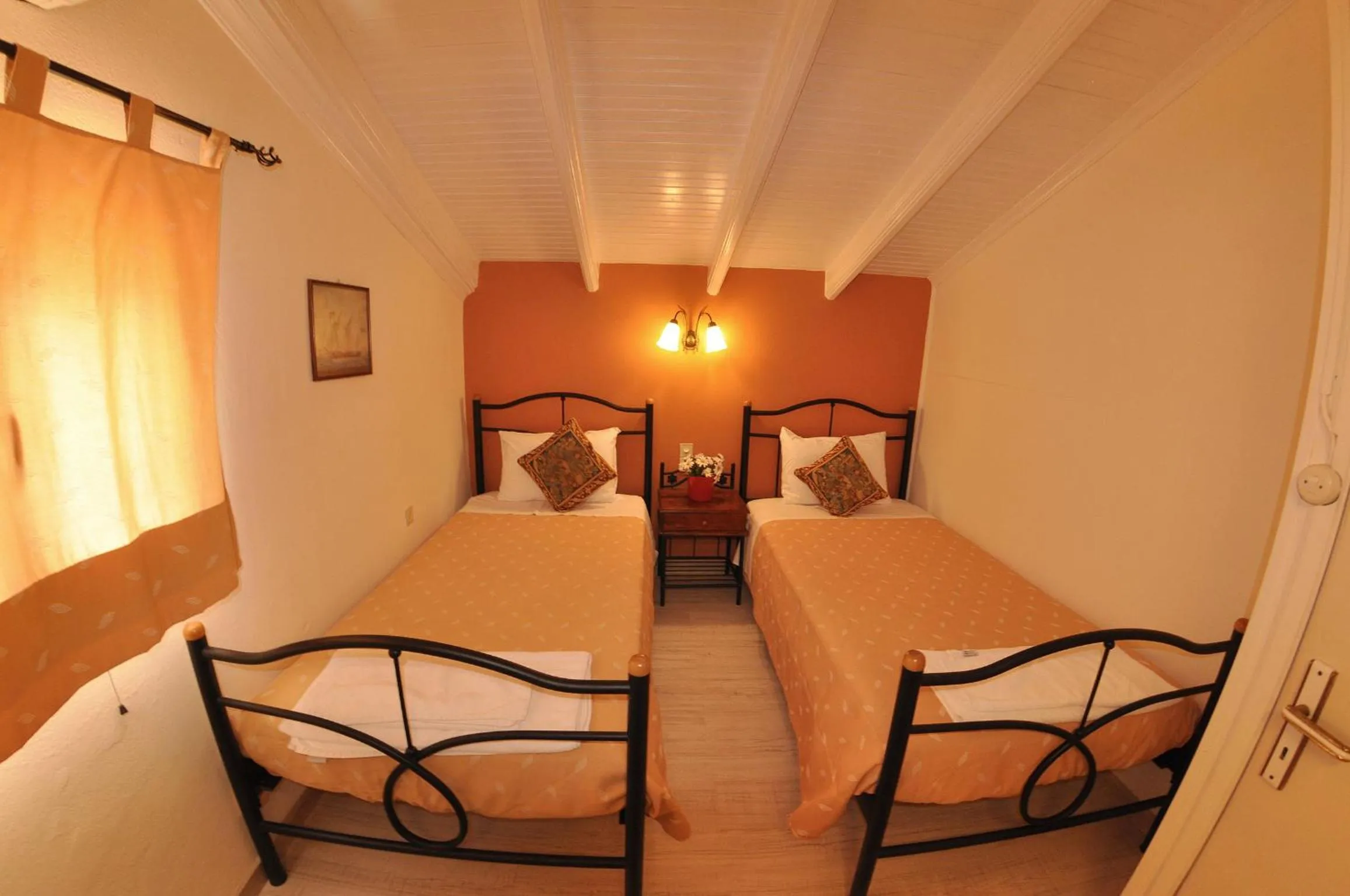 Bed in Mazis Apartments