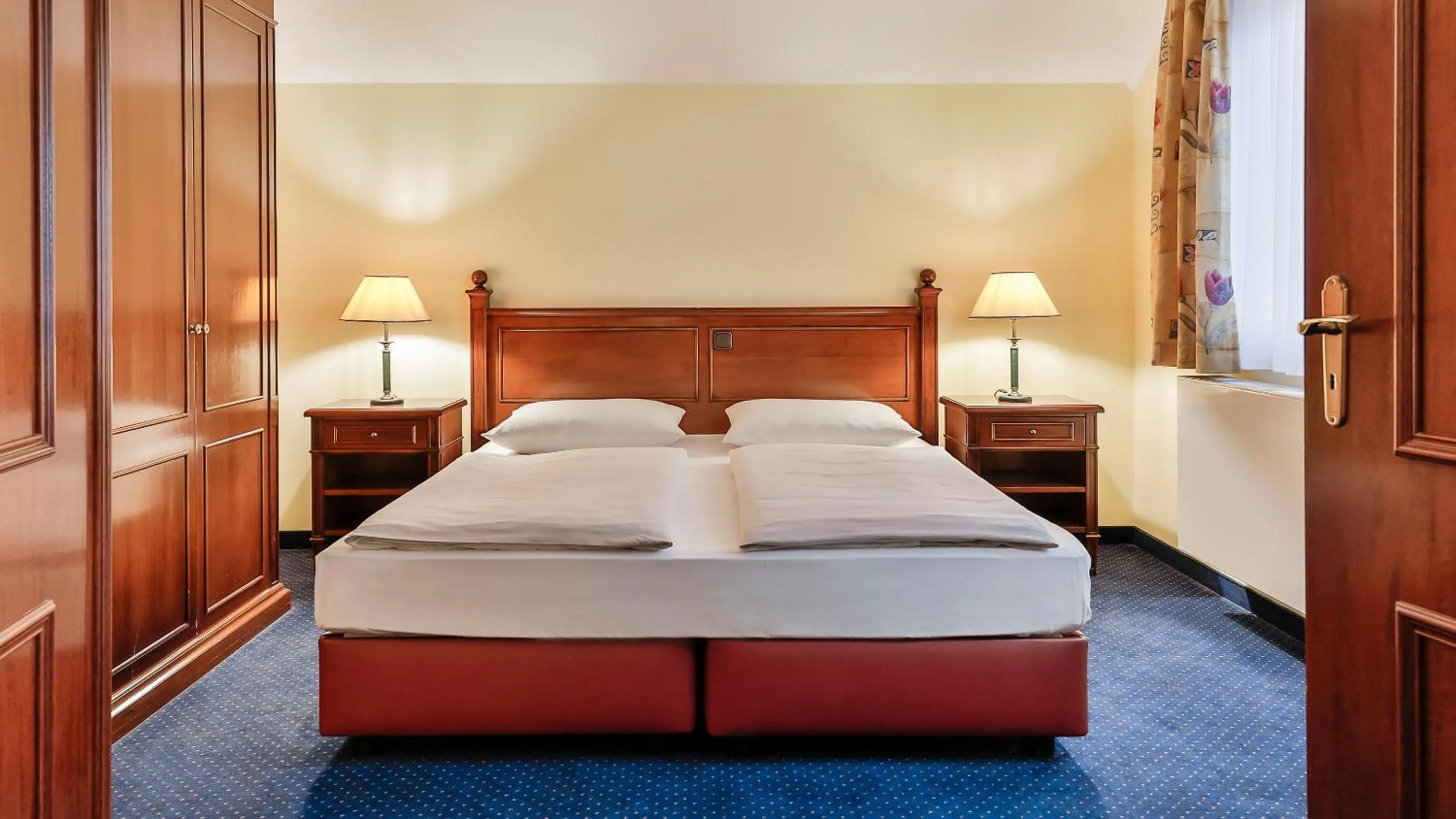 Bed in Dorint MARC AUREL Spa & Golf Resort