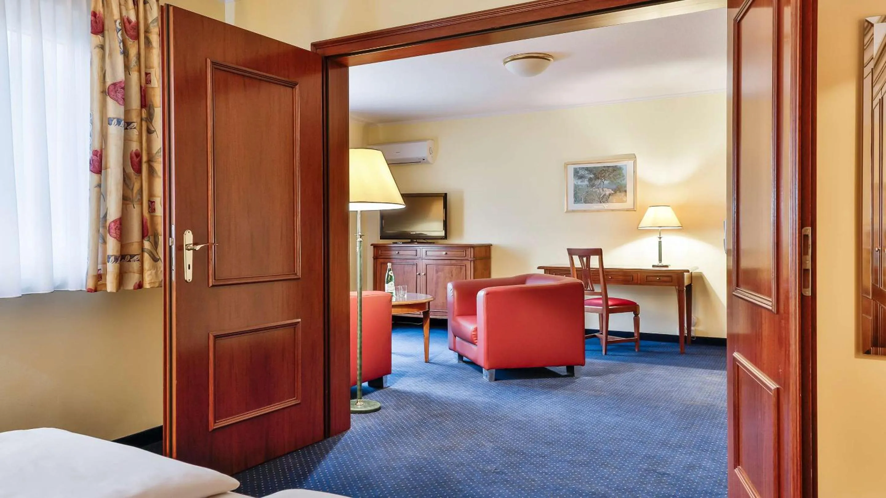 Photo of the whole room, Bed in Dorint MARC AUREL Spa & Golf Resort