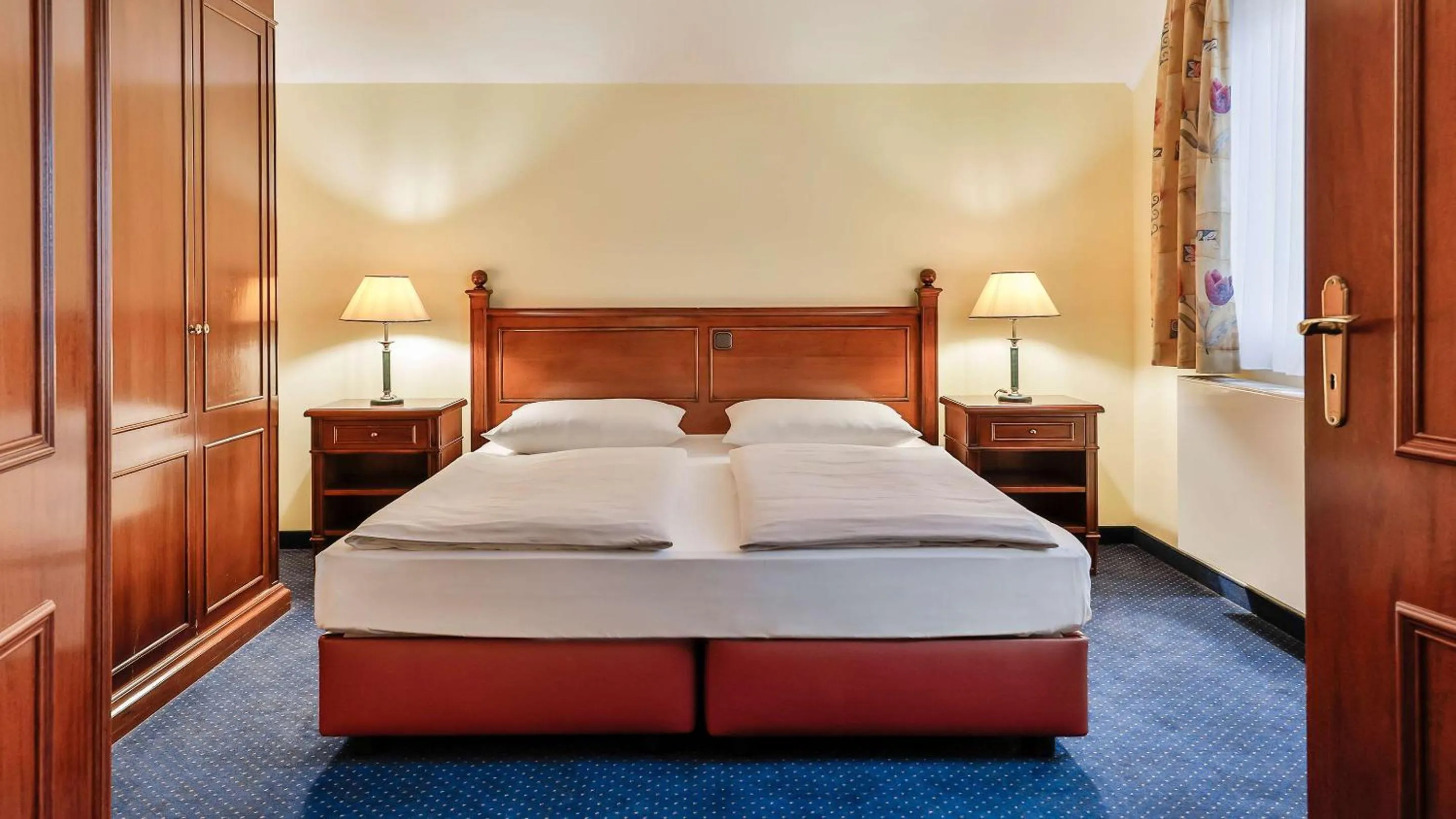 Photo of the whole room, Bed in Dorint MARC AUREL Spa & Golf Resort