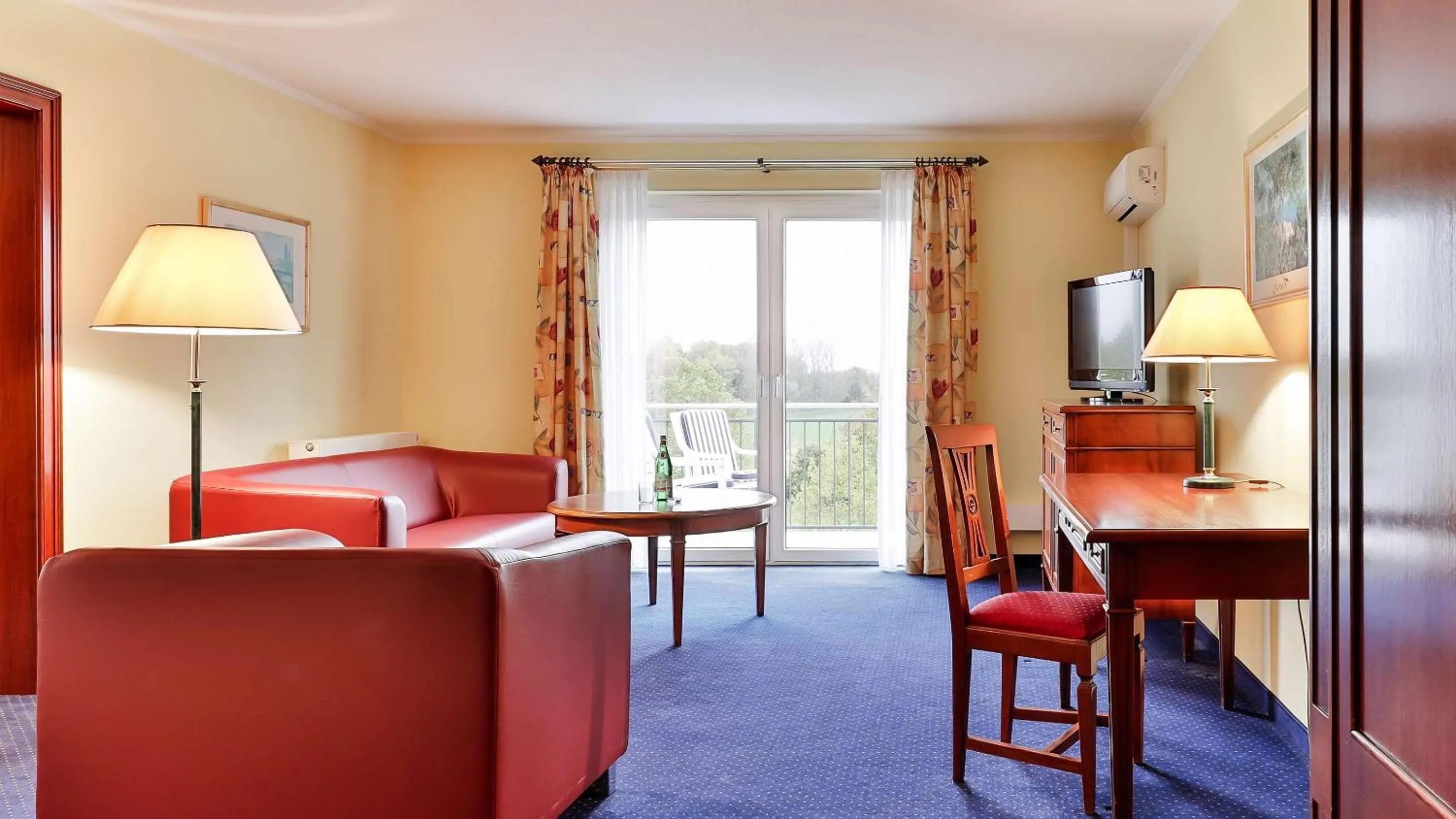 Photo of the whole room, Bed in Dorint MARC AUREL Spa & Golf Resort