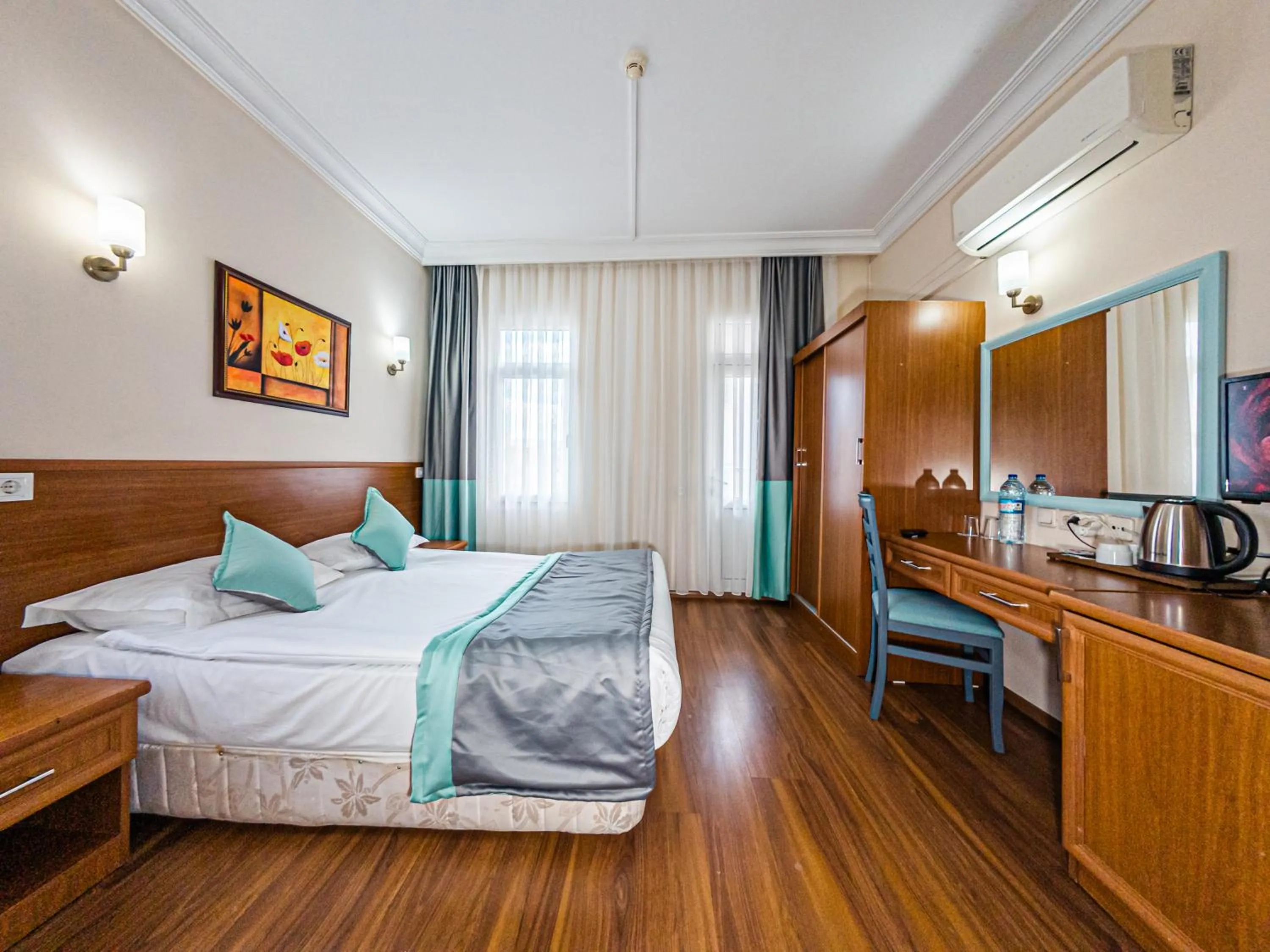 Bed in Triana Hotel