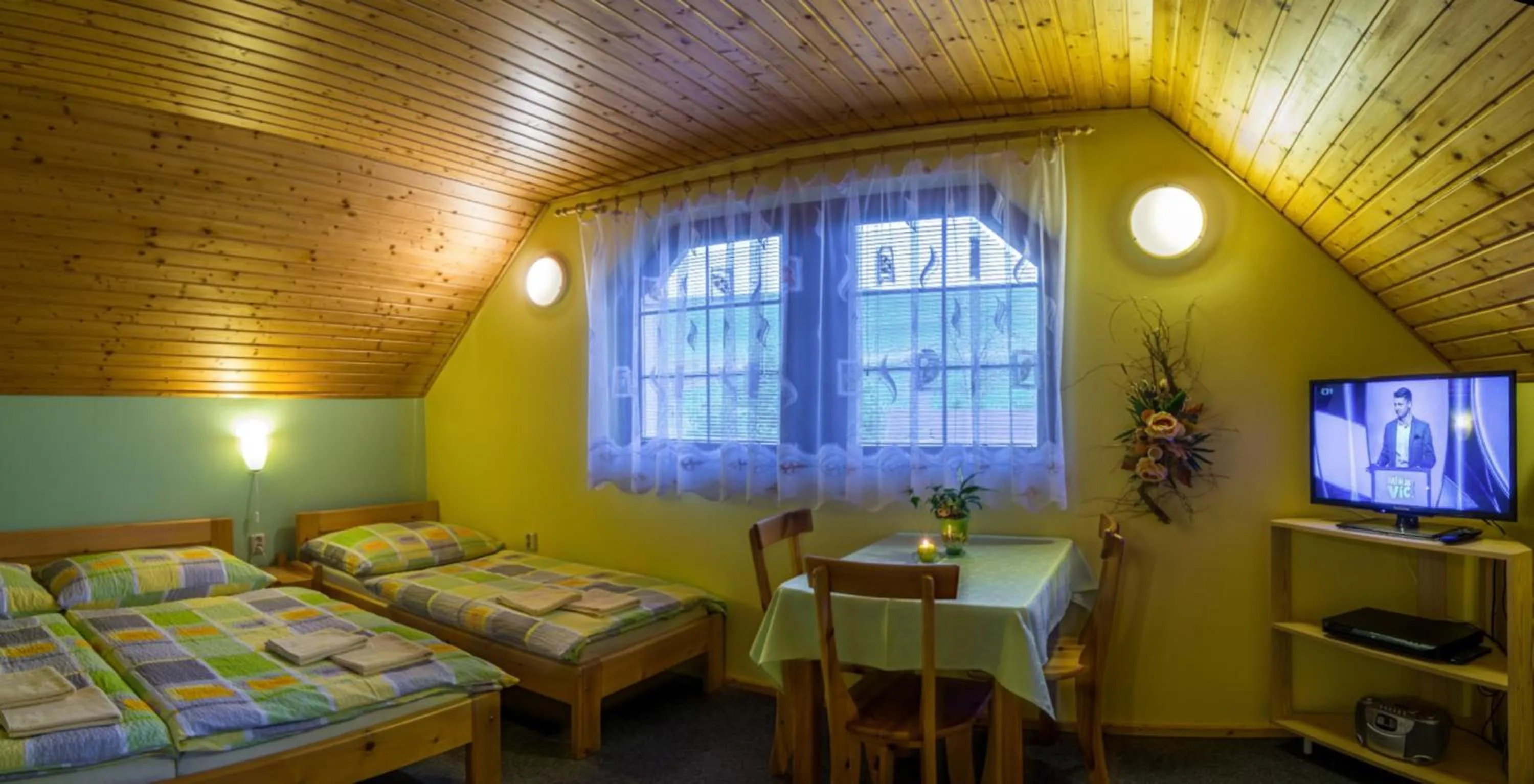 Living room, Bed in Ada Apartments