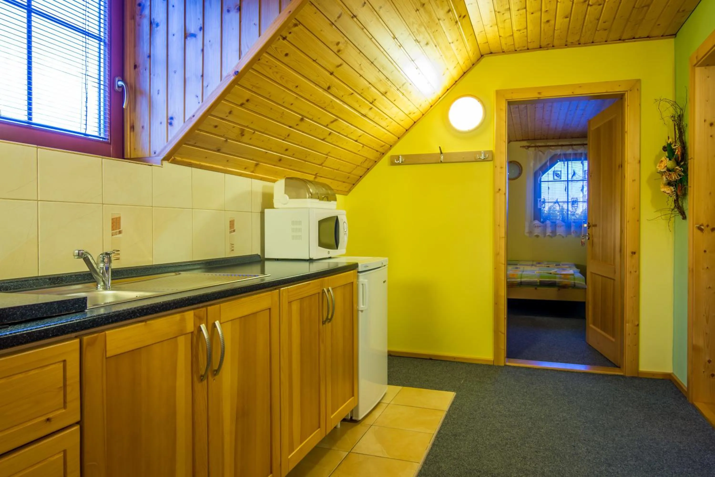 Kitchen or kitchenette in Ada Apartments