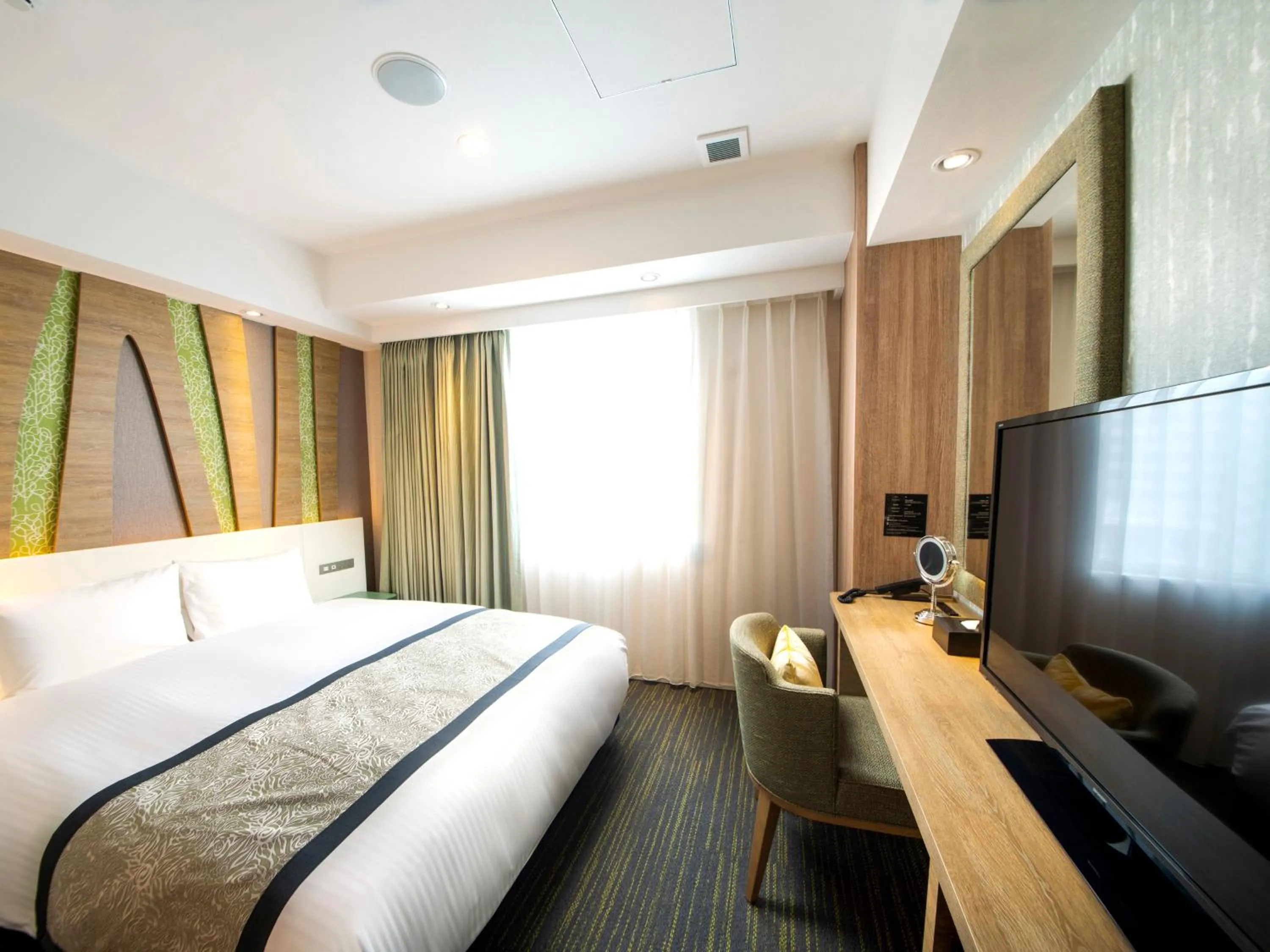 Bed in Hotel Torifito Naha Asahibashi