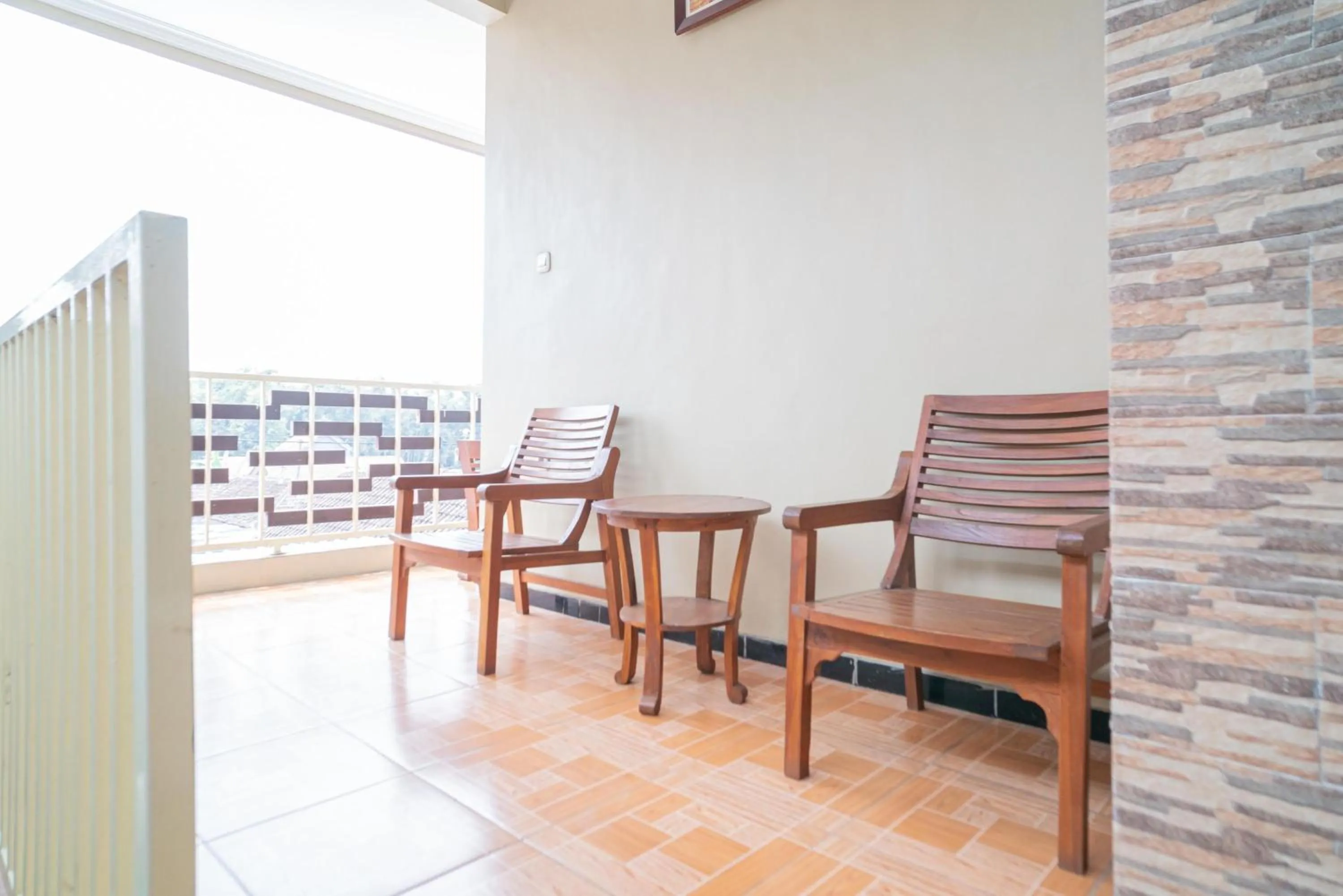 Seating area in RedDoorz At Villa Akbar 3