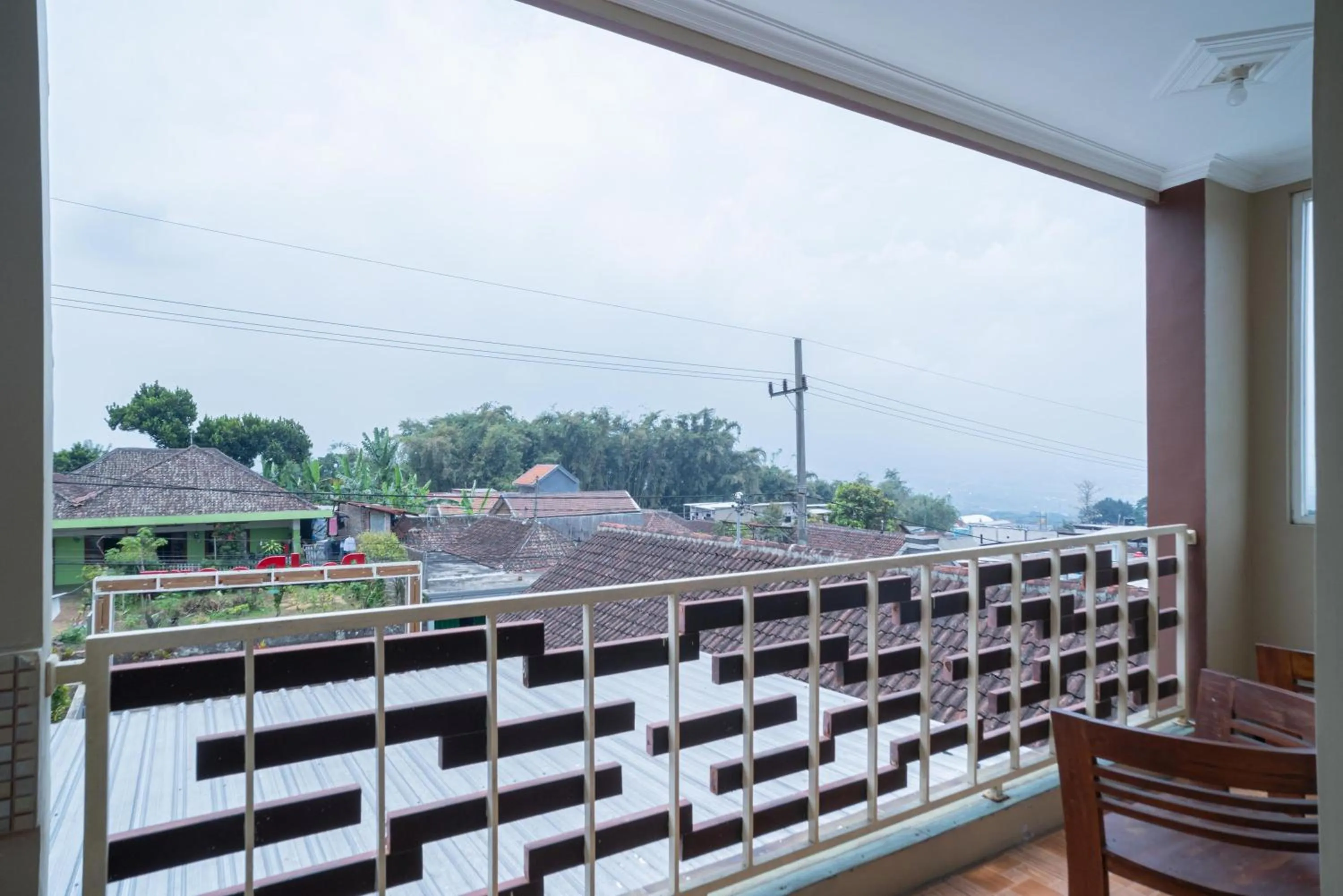 Balcony/Terrace in RedDoorz At Villa Akbar 3