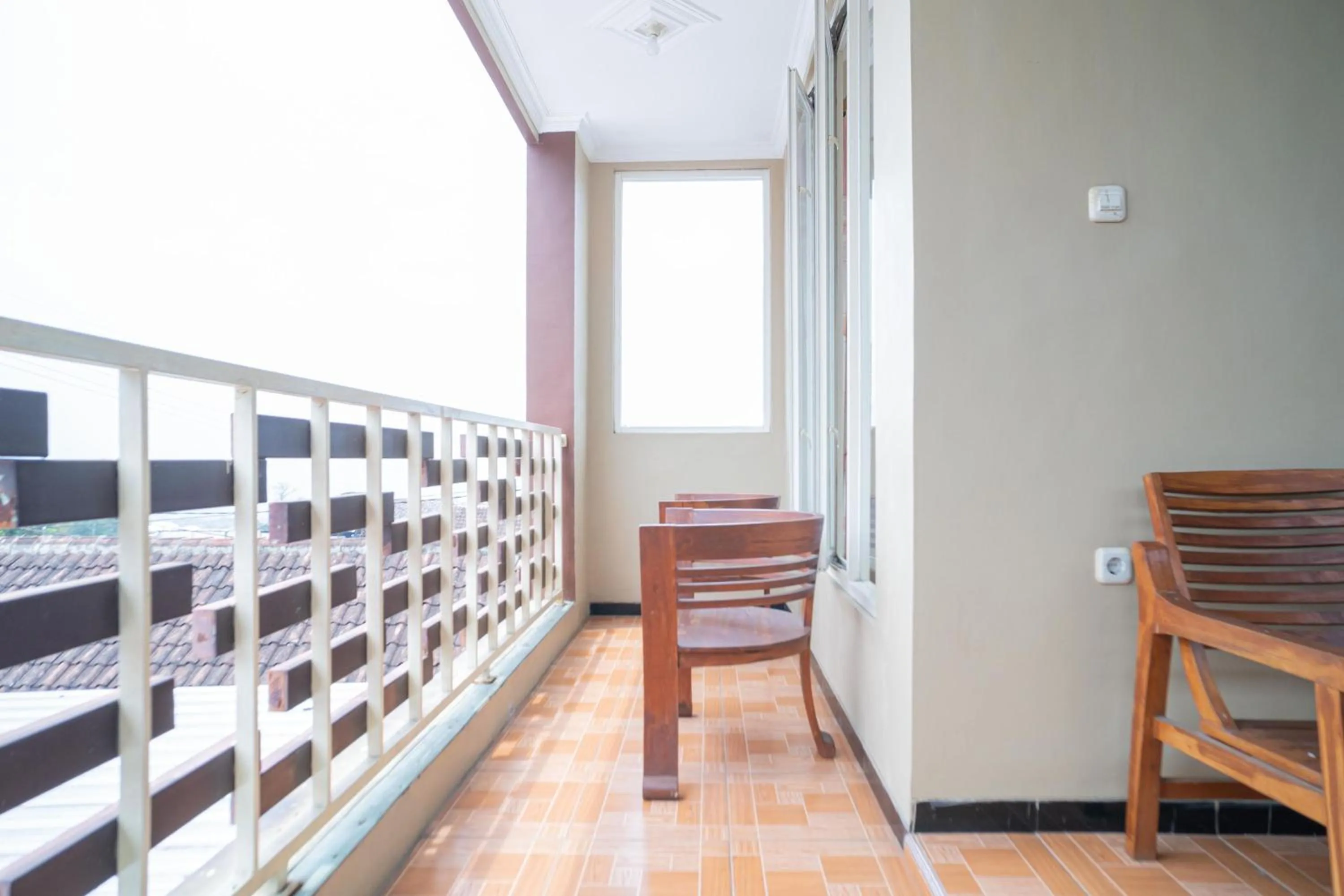 Seating area in RedDoorz At Villa Akbar 3
