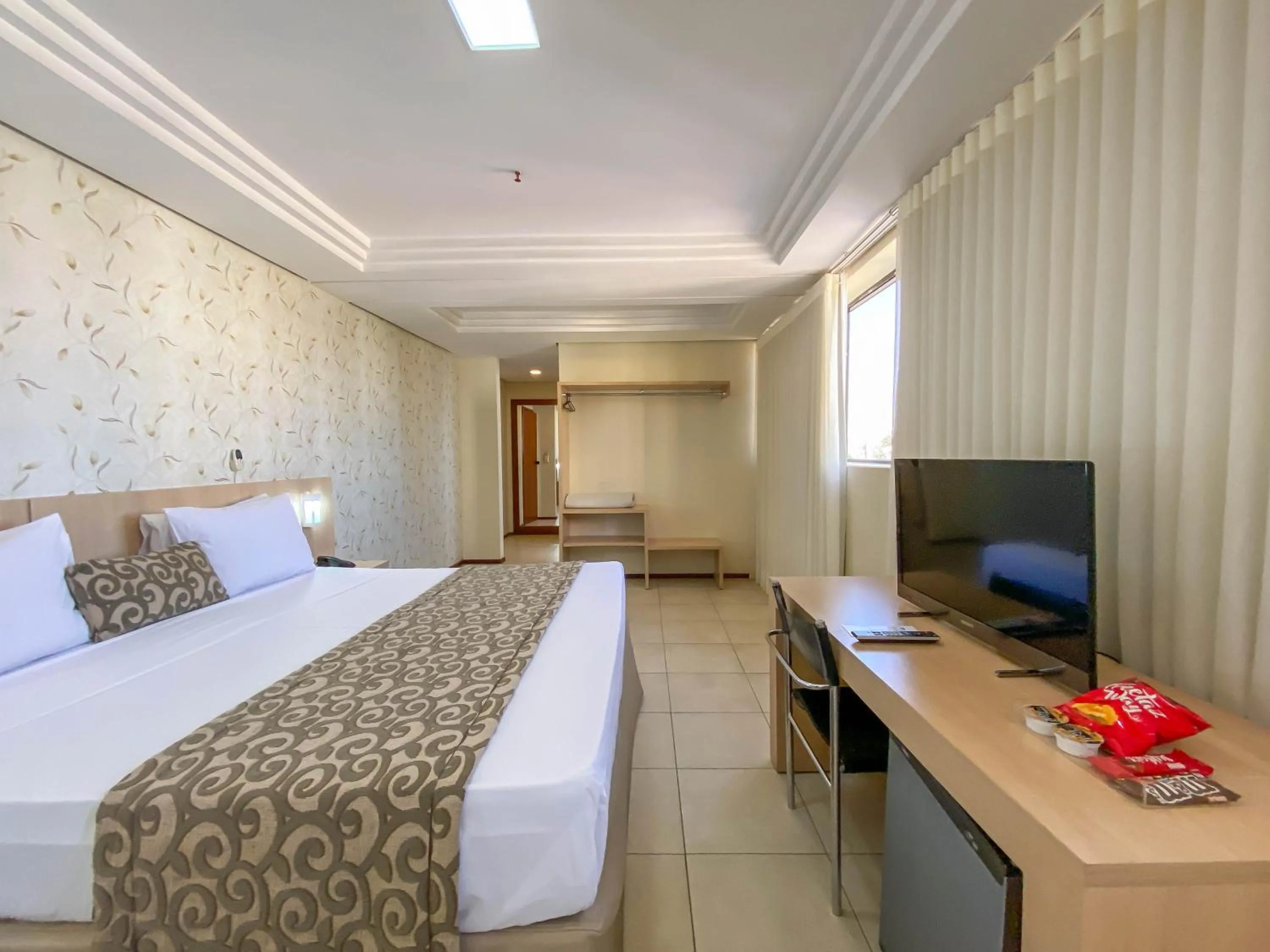 Bed in Crystal Plaza Hotel