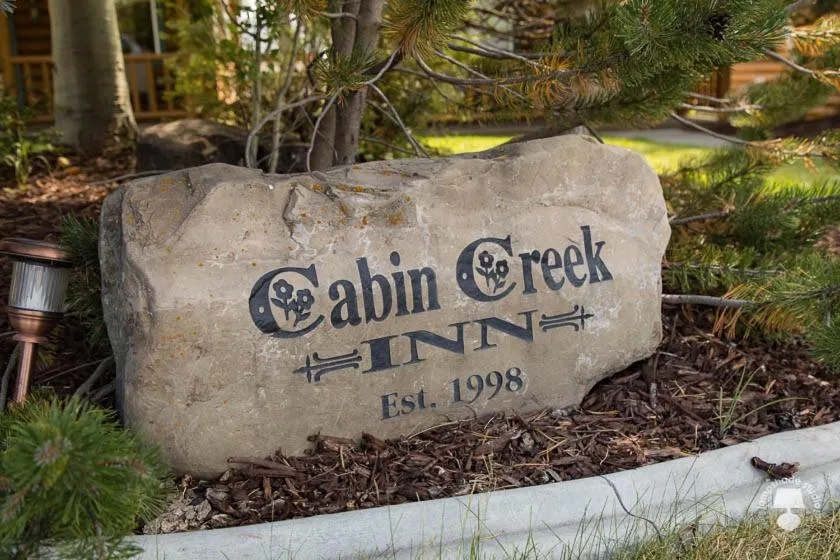 Property logo or sign in Cabin Creek Inn