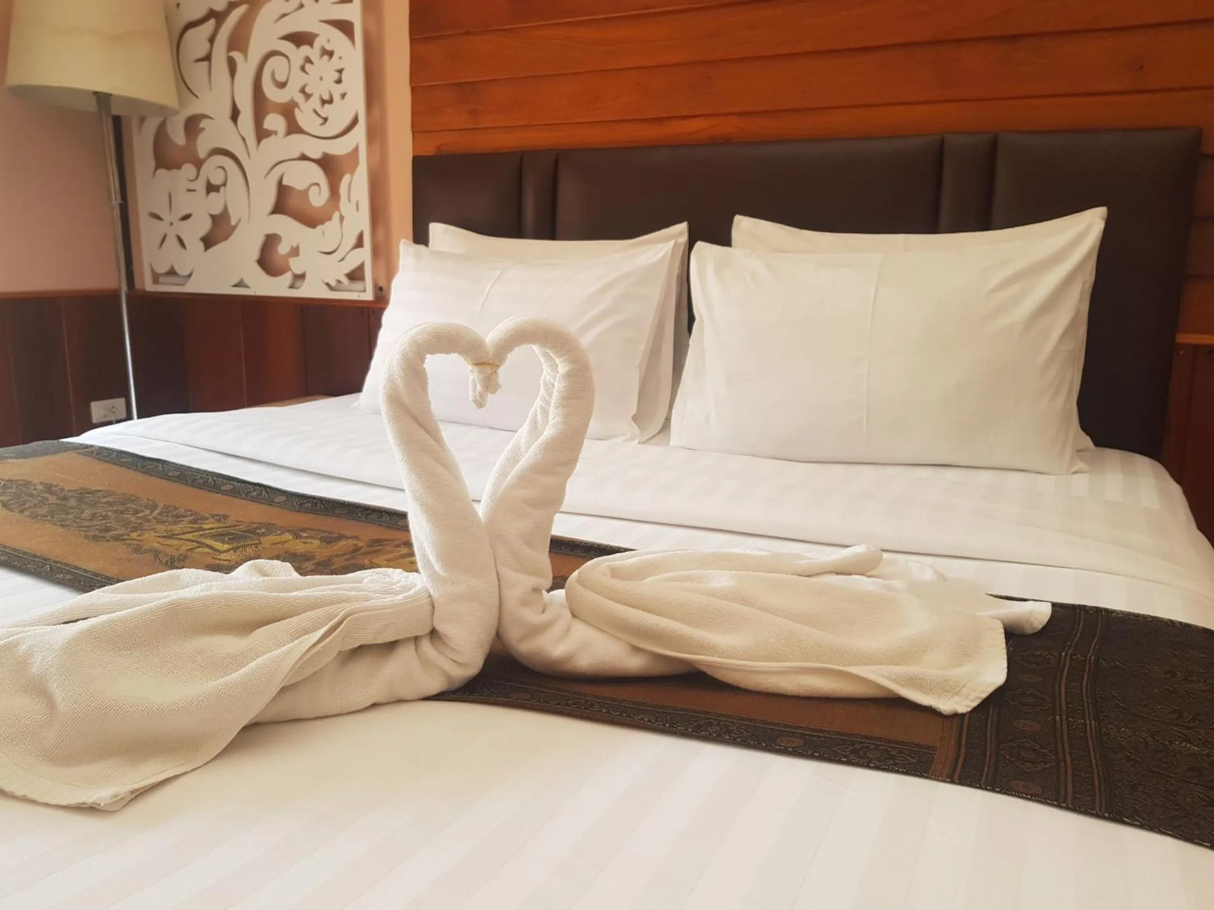 Bed in Naga Tara Boutique Resort