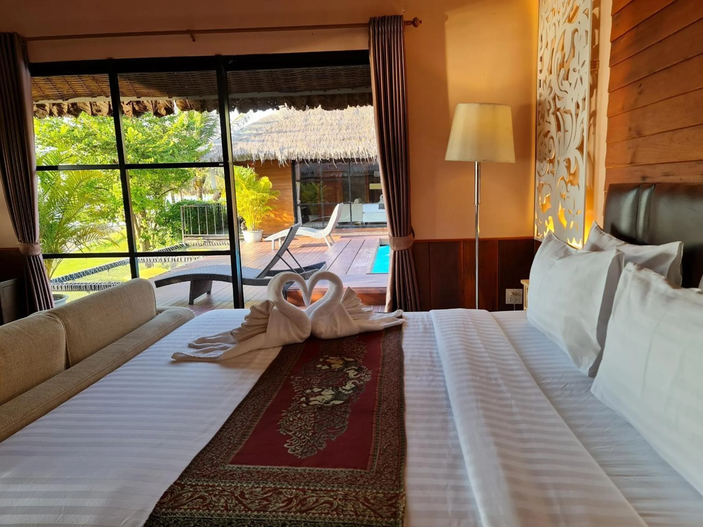 Bed in Naga Tara Boutique Resort