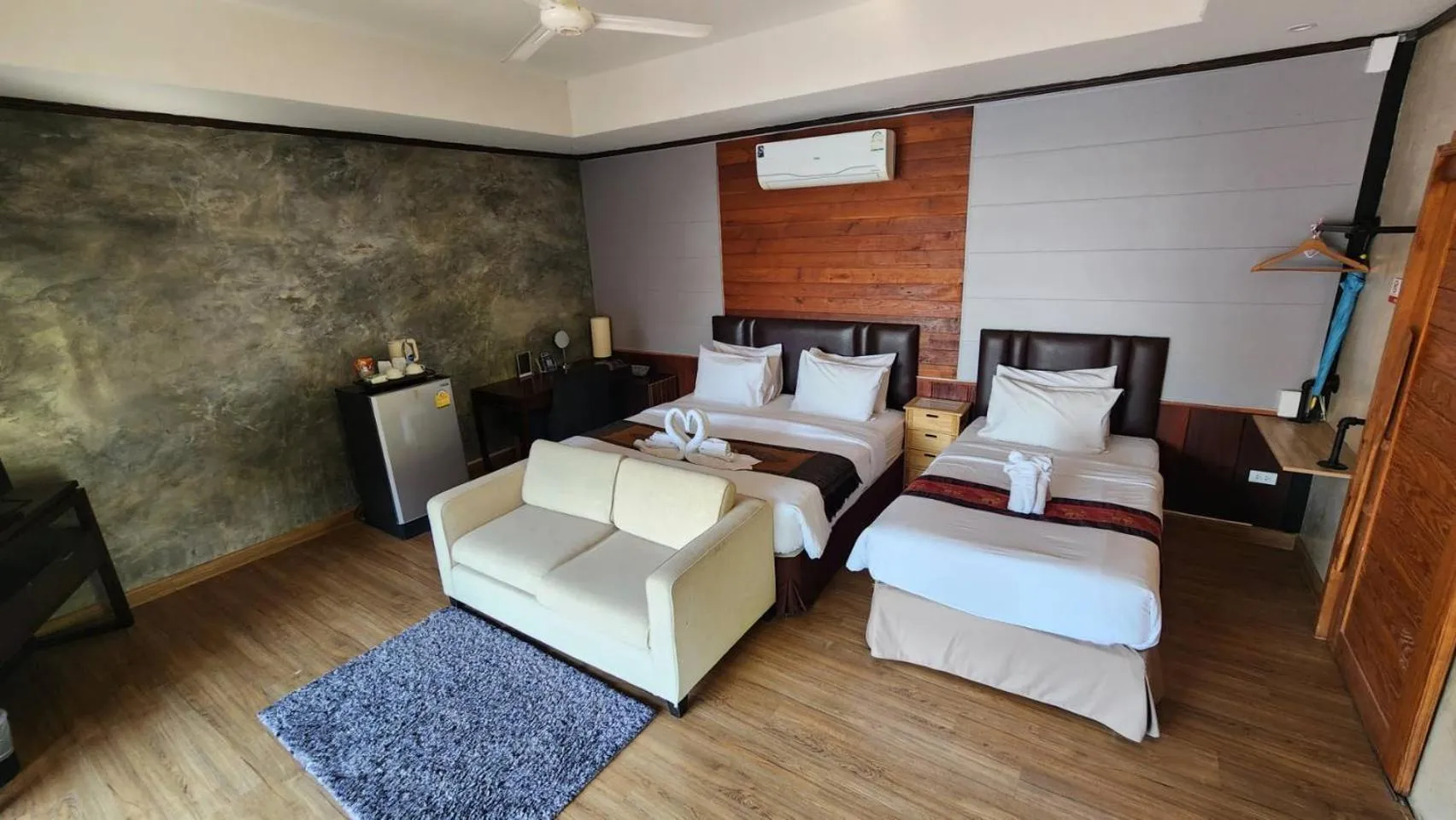 Bed in Naga Tara Boutique Resort