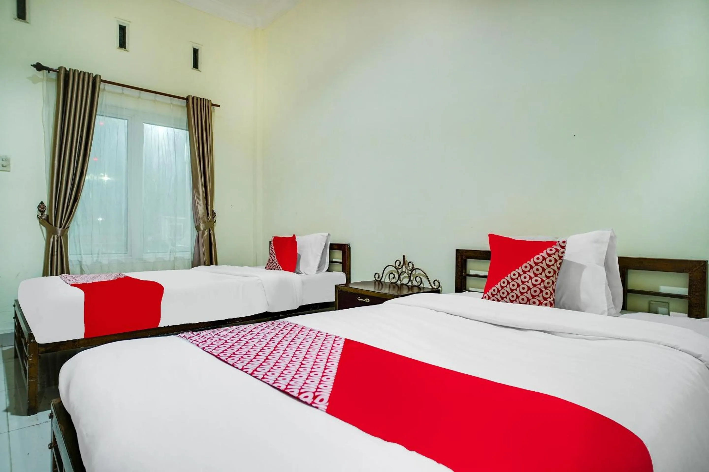 Bedroom in Capital O 540 Esther Hotel