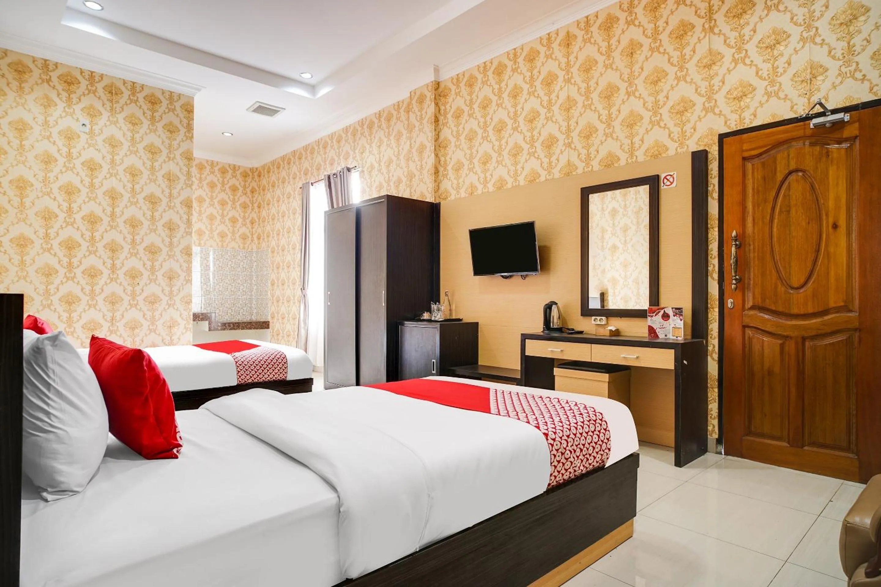 Bedroom in Capital O 540 Esther Hotel