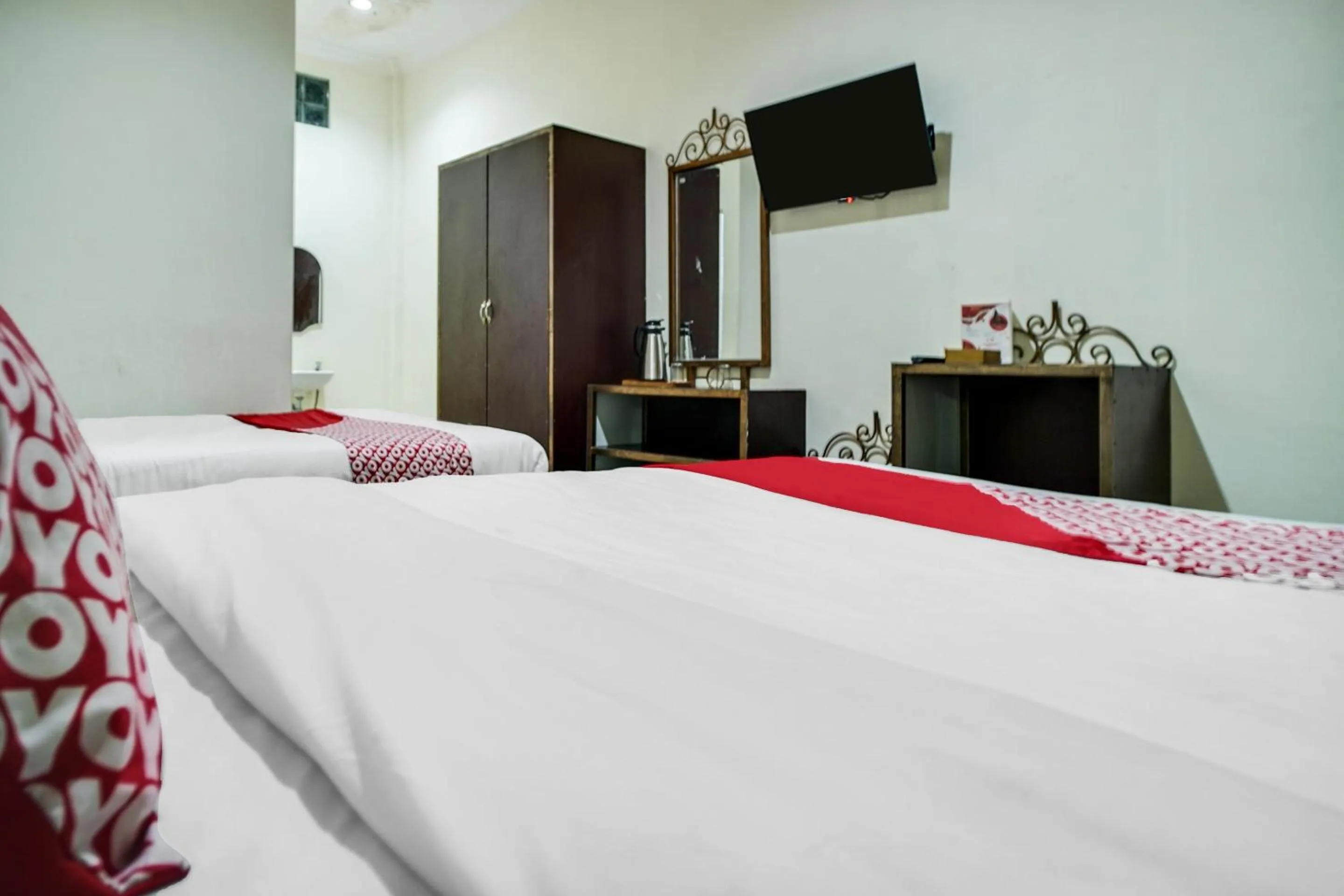 Bedroom in Capital O 540 Esther Hotel