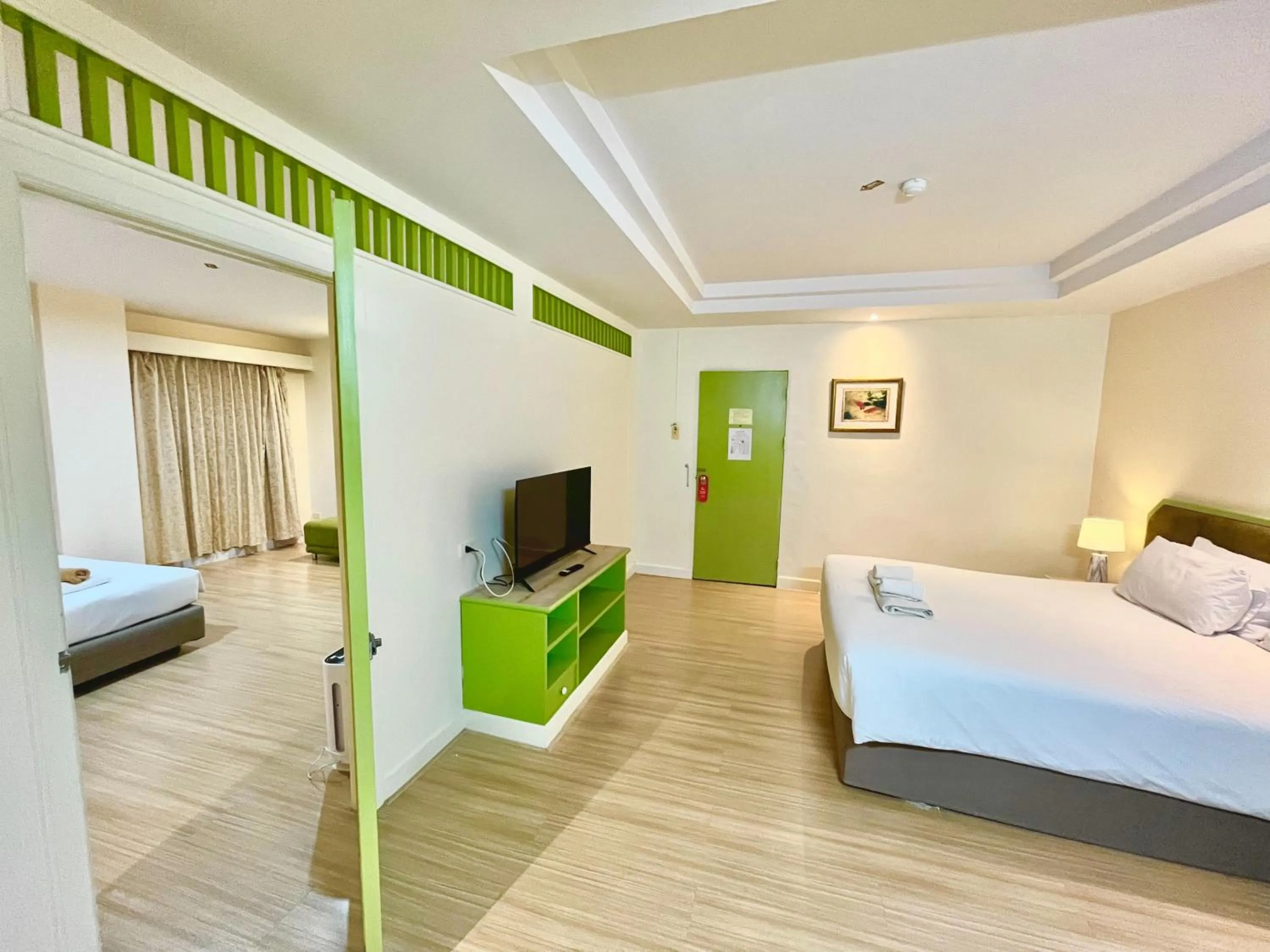 Bedroom, Bed in Friendlytel Hotel